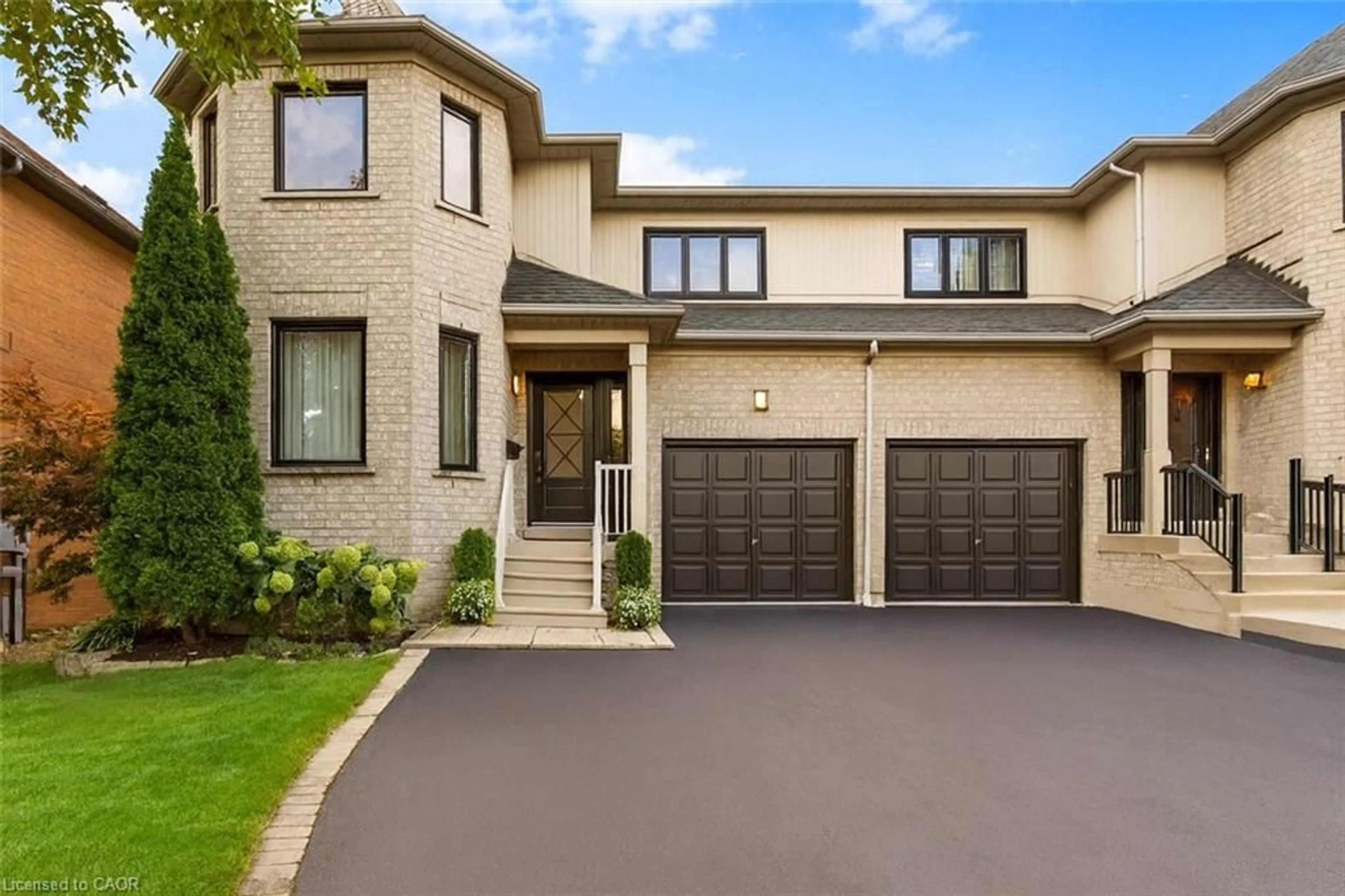 Home with brick exterior material, street for 2306 Bankside Dr, Mississauga Ontario L5M 6E1