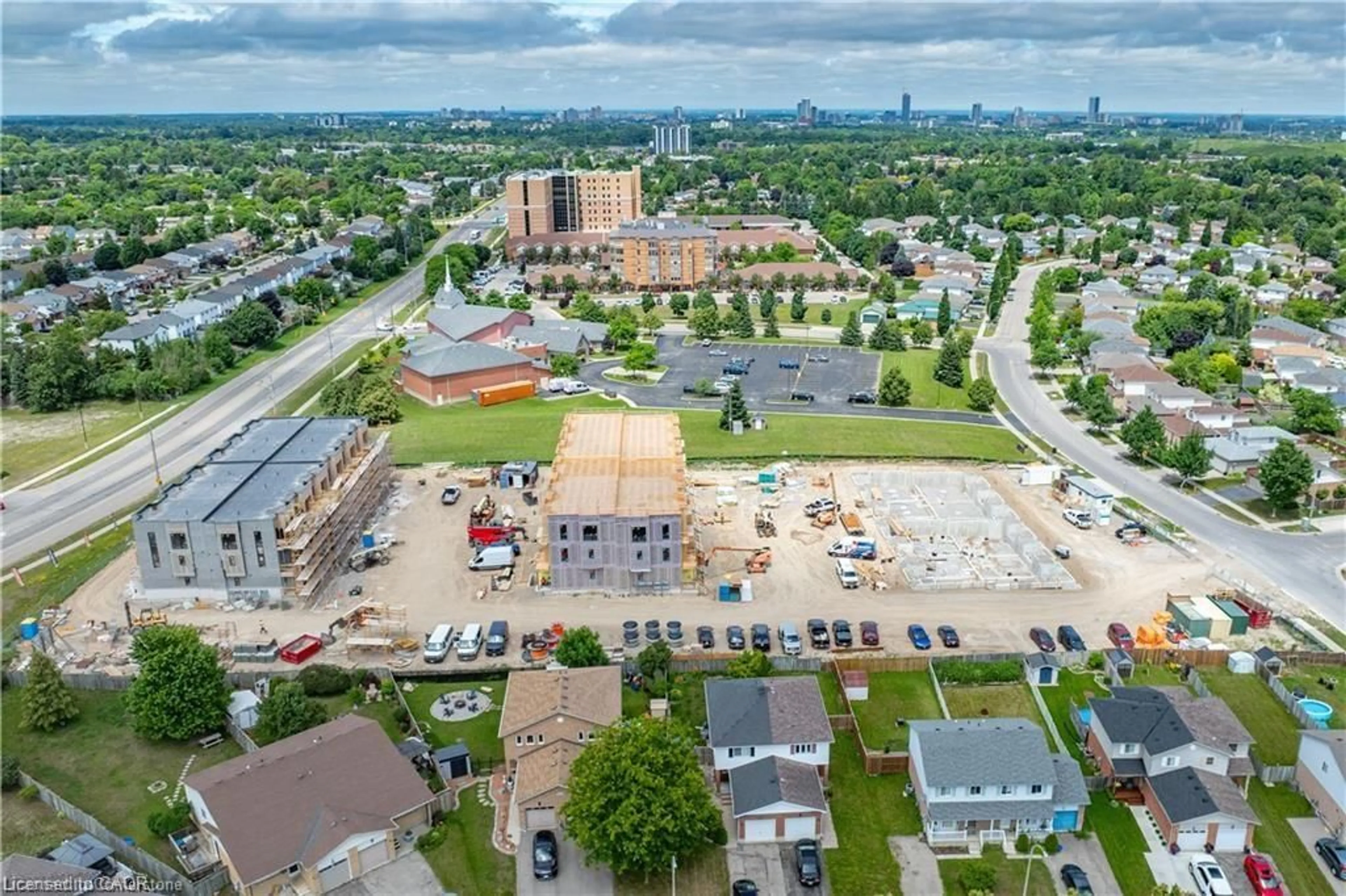 A pic from outside/outdoor area/front of a property/back of a property/a pic from drone, city buildings view from balcony for 525 Erinbrook Dr #B033, Kitchener Ontario N2E 3T1