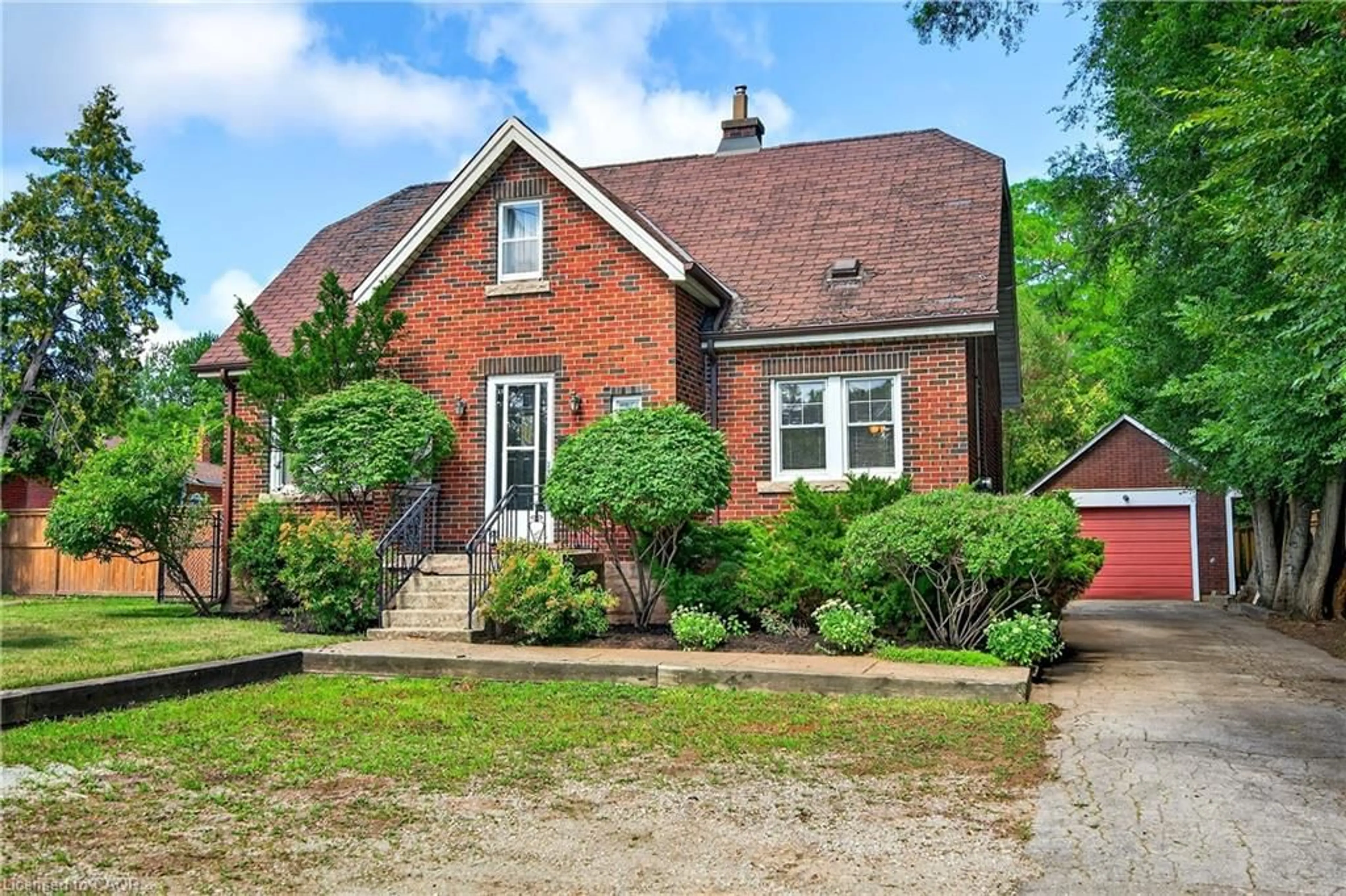 Home with brick exterior material, street for 1025 King Rd, Burlington Ontario L7T 3L5