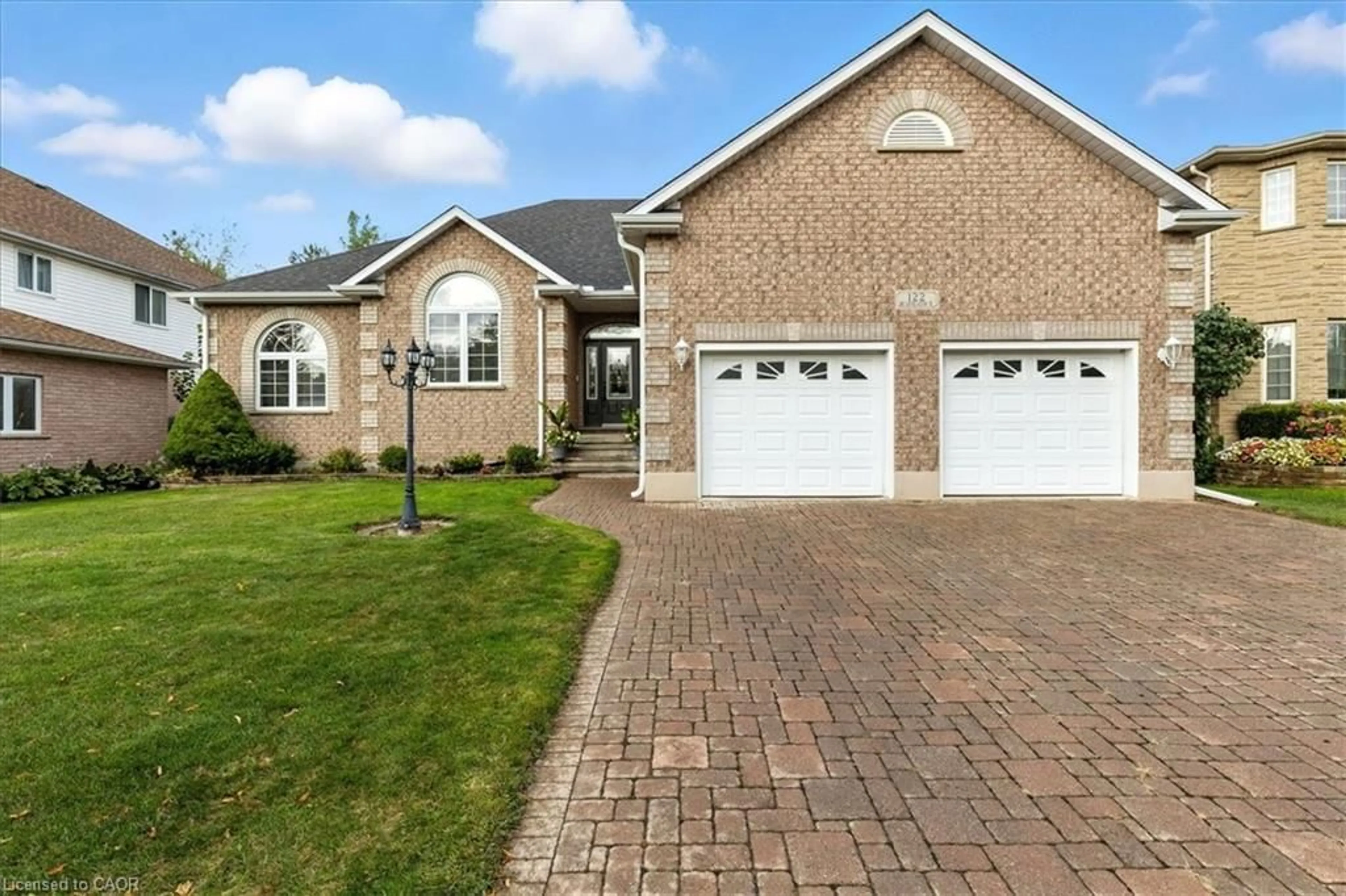 Home with brick exterior material, street for 122 Briarmeadow Pl, Kitchener Ontario N2A 4C6