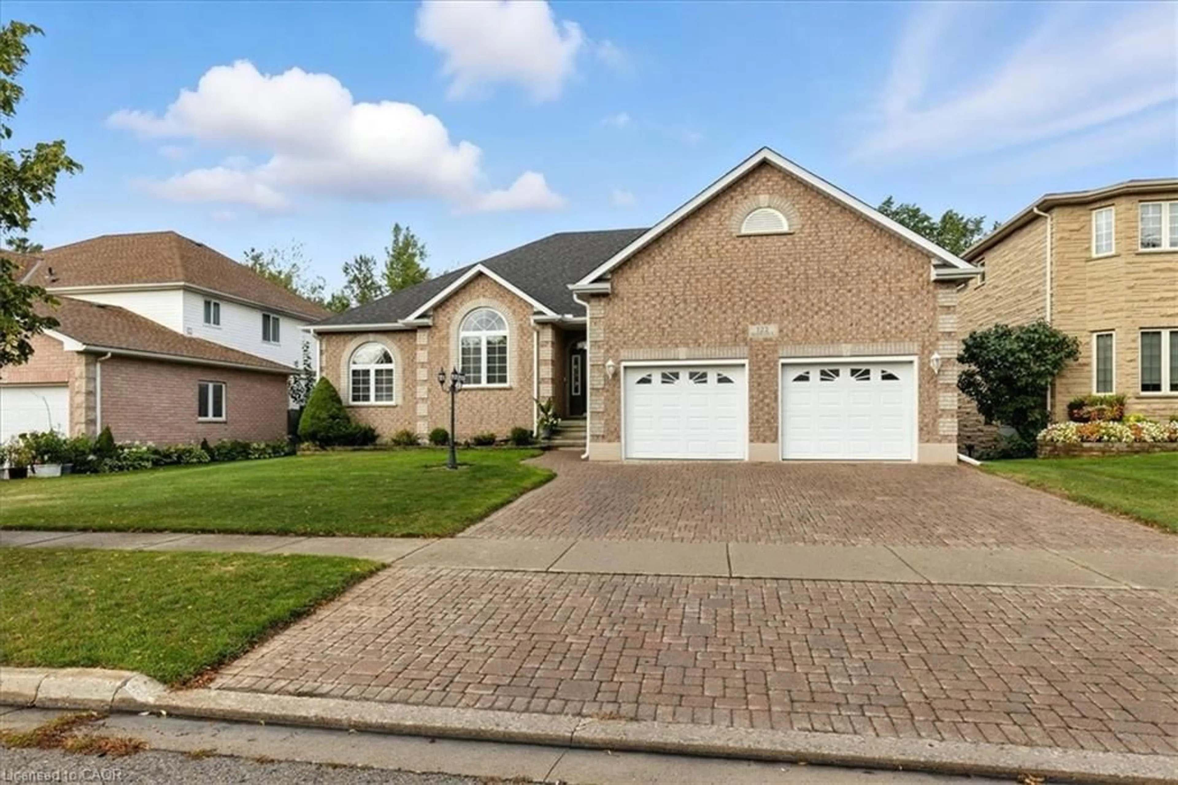 Home with brick exterior material, street for 122 Briarmeadow Pl, Kitchener Ontario N2A 4C6