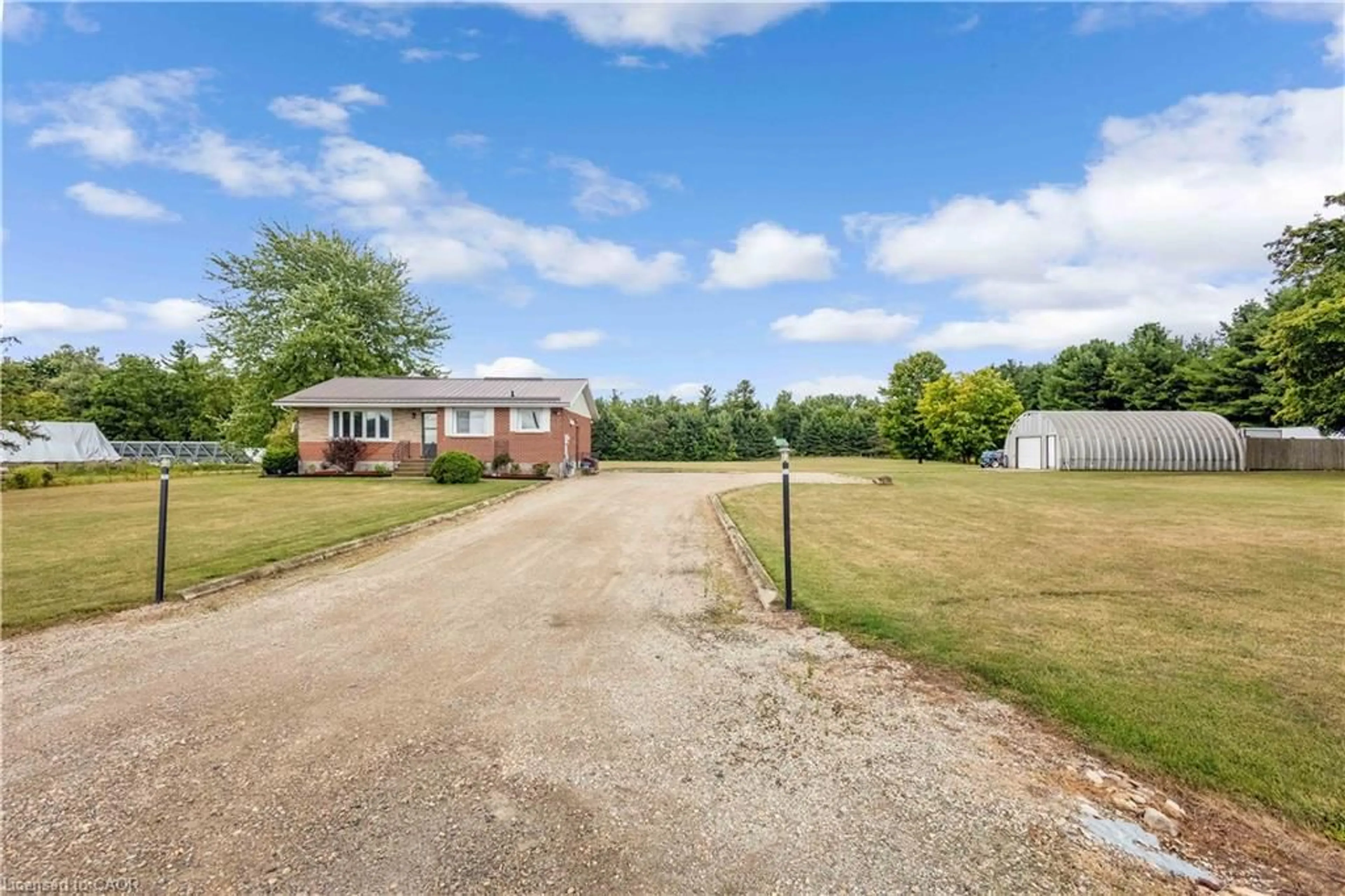 A pic from outside/outdoor area/front of a property/back of a property/a pic from drone, unknown for 745920 Township 4 Rd, Woodstock Ontario N4S 7V9