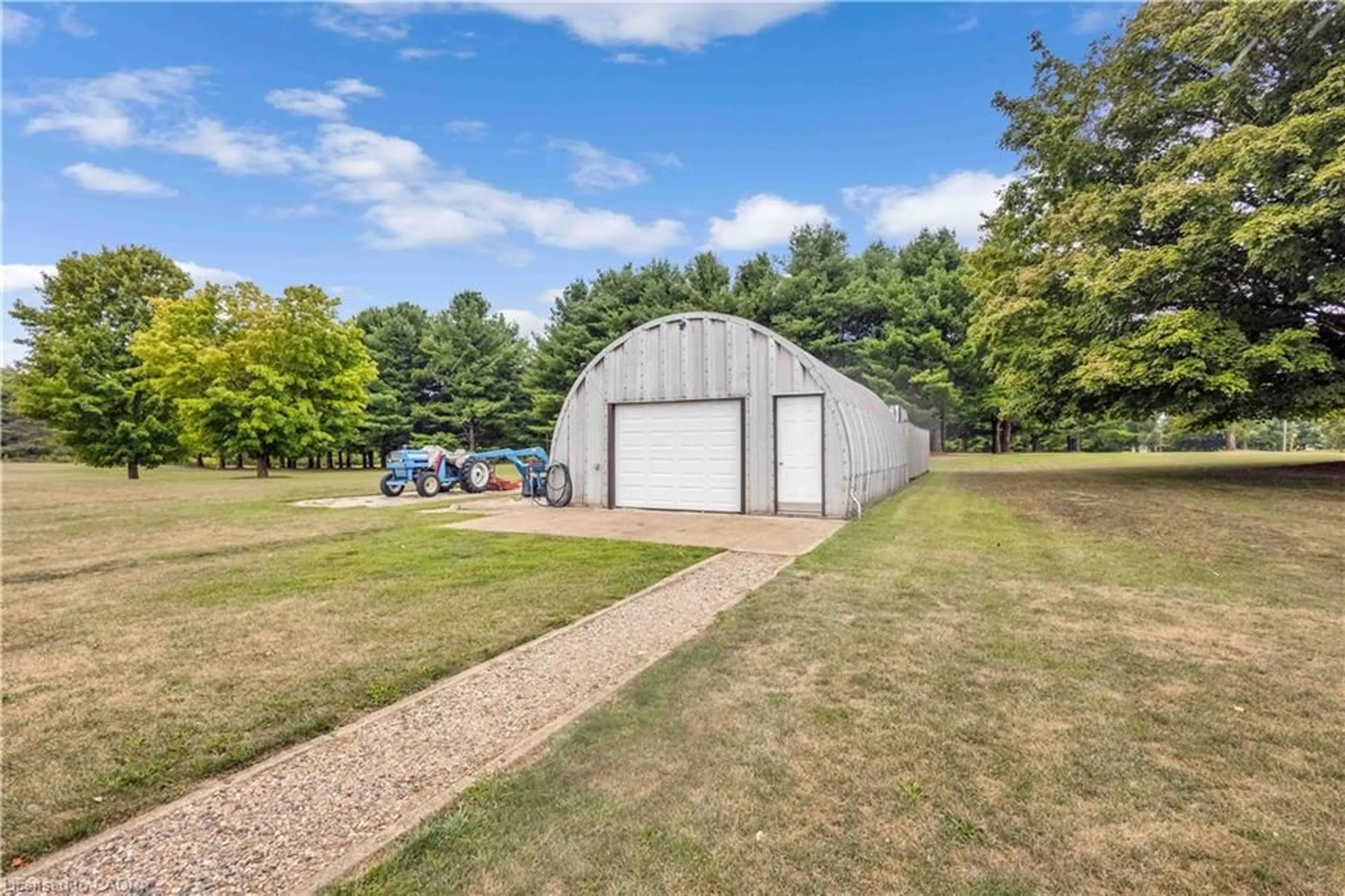 A pic from outside/outdoor area/front of a property/back of a property/a pic from drone, unknown for 745920 Township 4 Rd, Woodstock Ontario N4S 7V9