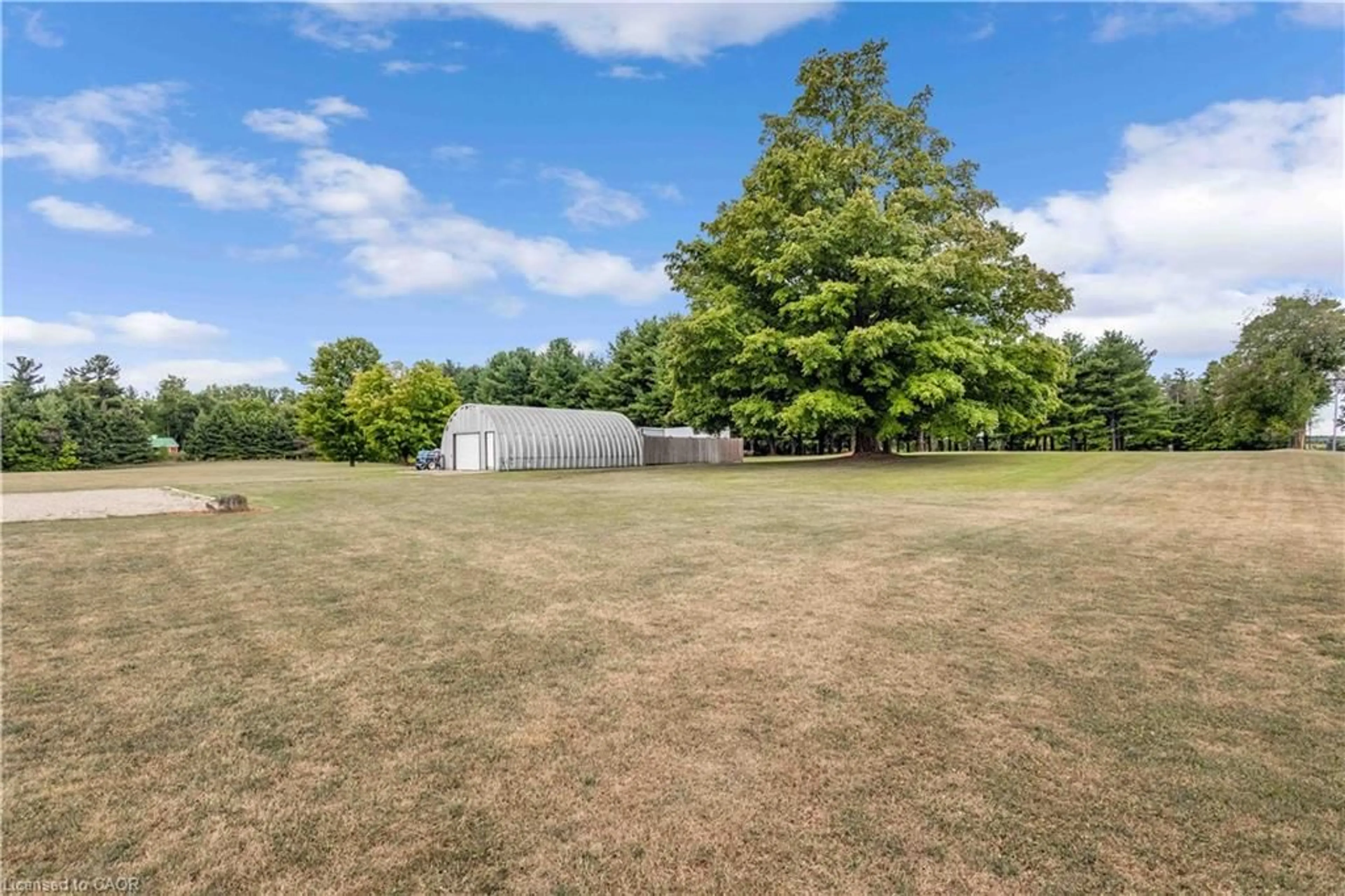 A pic from outside/outdoor area/front of a property/back of a property/a pic from drone, unknown for 745920 Township 4 Rd, Woodstock Ontario N4S 7V9