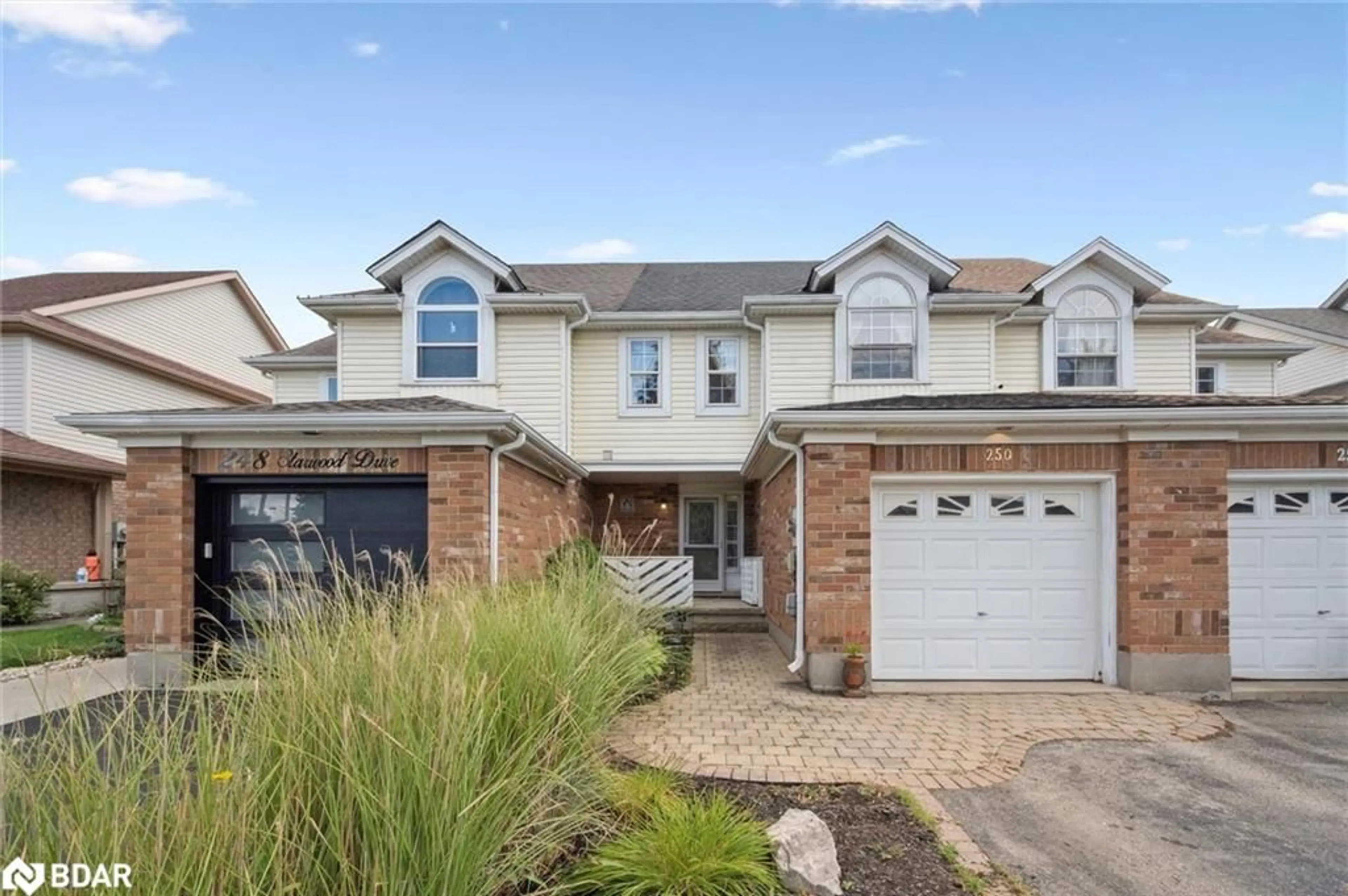 Home with brick exterior material, street for 250 Starwood Dr Dr, Guelph Ontario N1E 7C1
