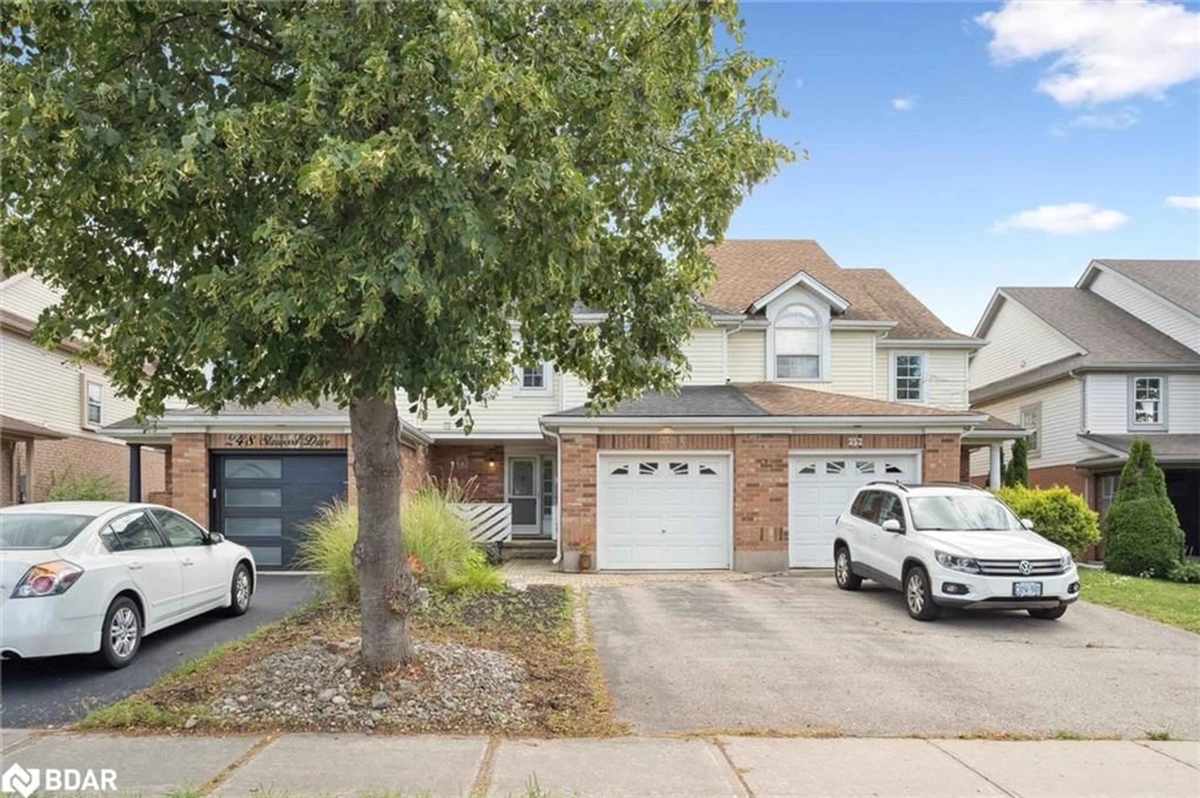 Home with brick exterior material, street for 250 Starwood Dr Dr, Guelph Ontario N1E 7C1