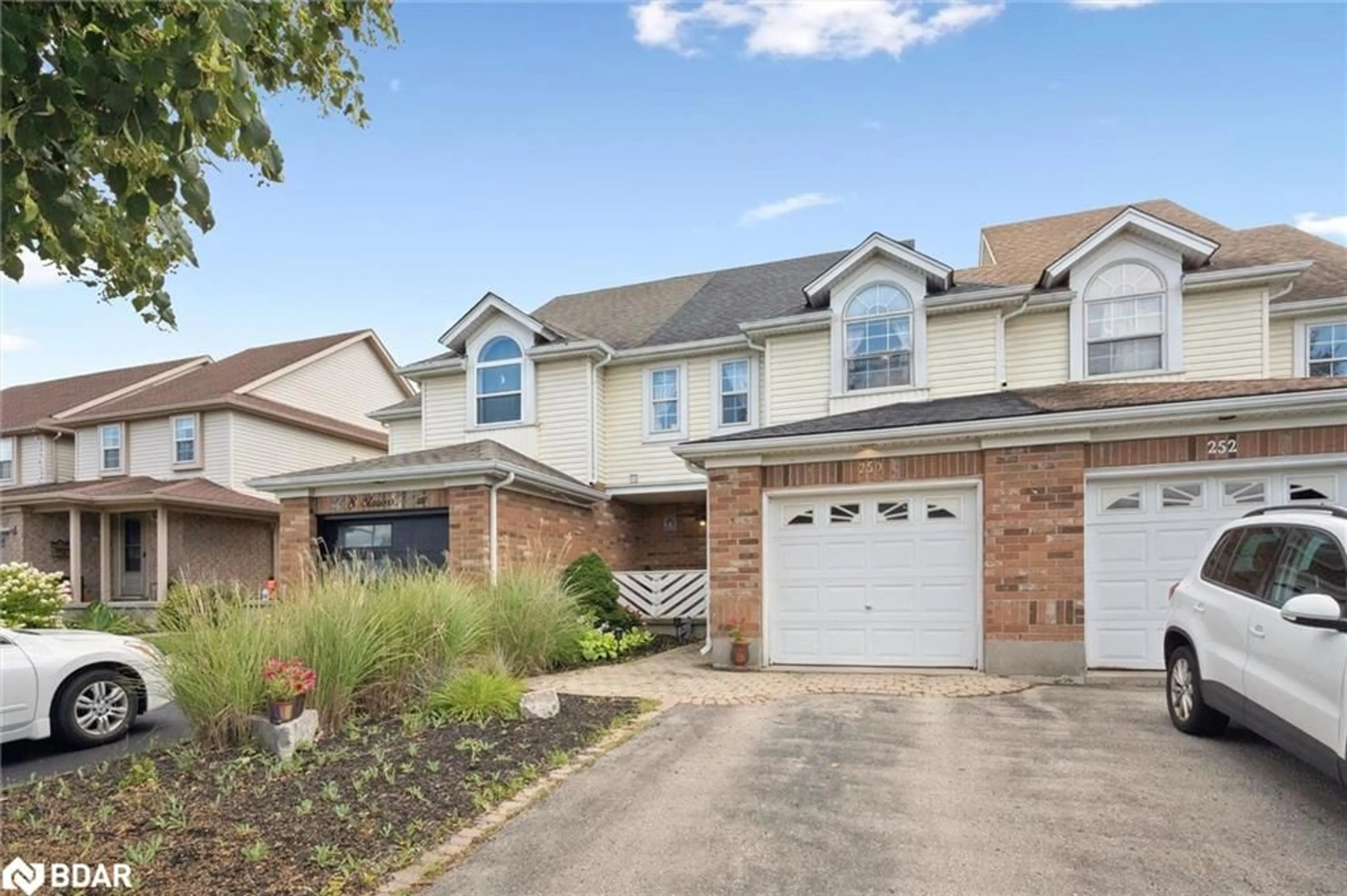 Home with brick exterior material, street for 250 Starwood Dr Dr, Guelph Ontario N1E 7C1