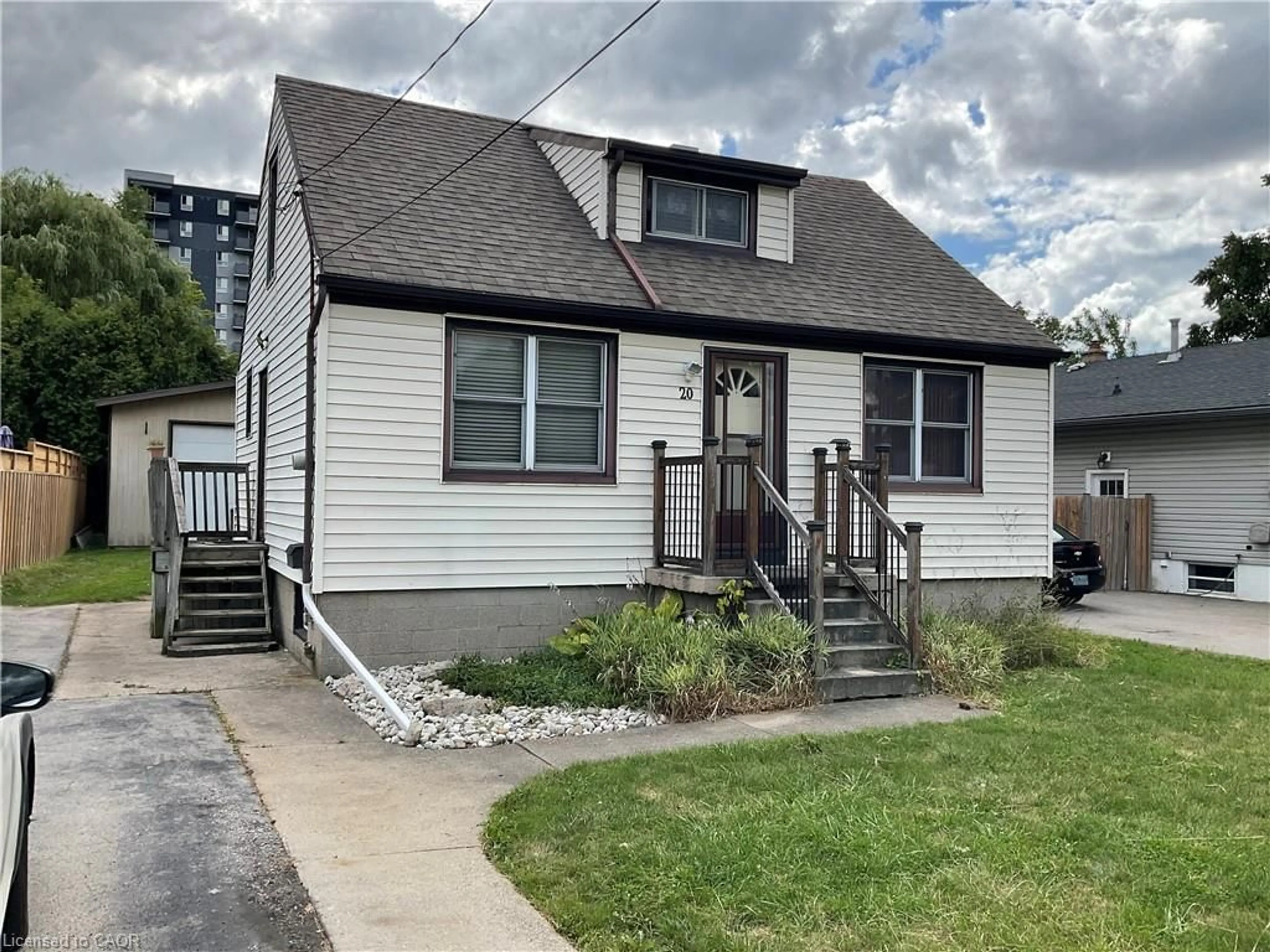 Home with vinyl exterior material, street for 20 Pemberton Ave, Hamilton Ontario L8T 2J5