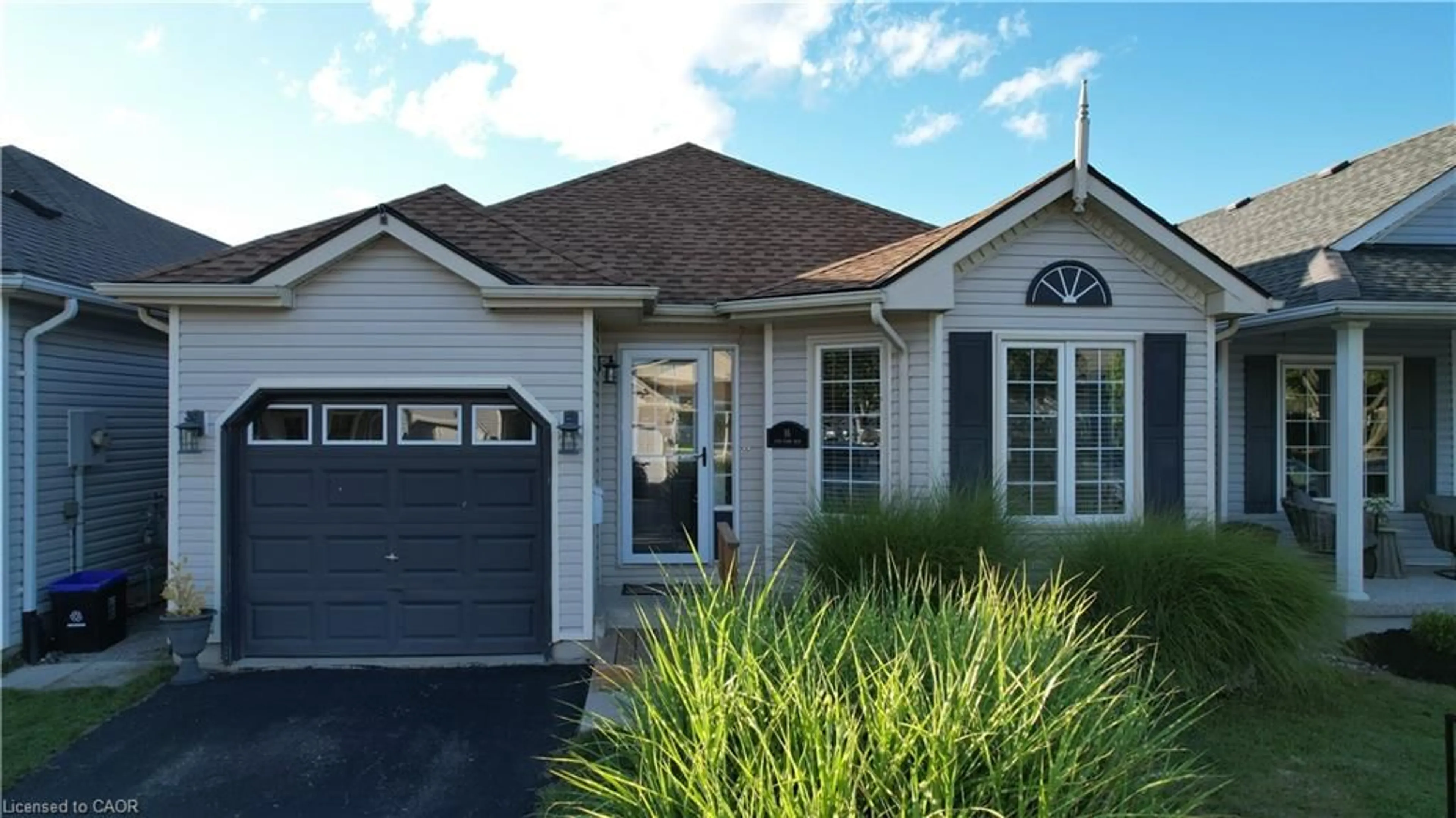 Home with vinyl exterior material, street for 16 Long Point Blvd, Port Rowan Ontario N0E 1M0