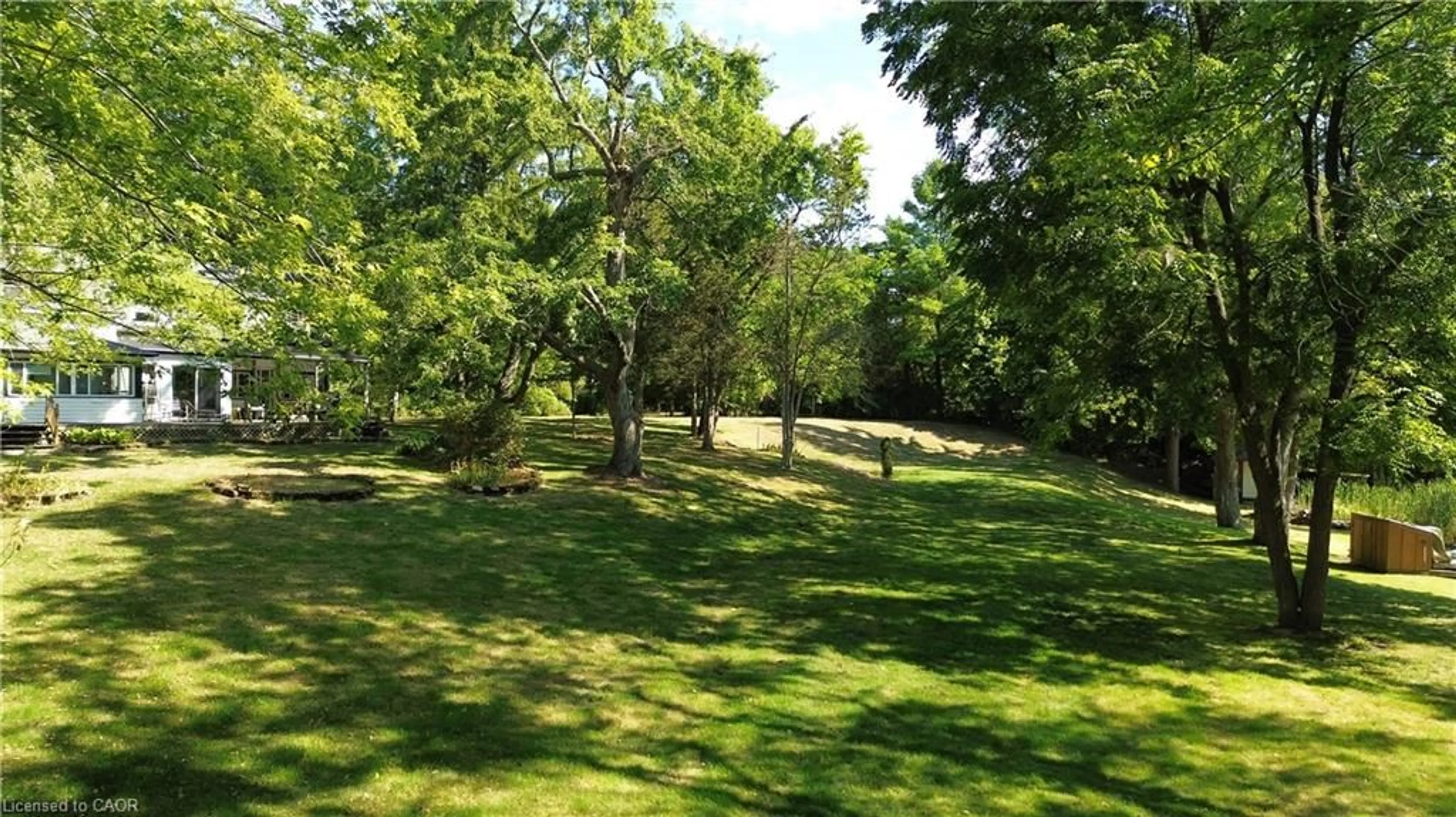 A pic from outside/outdoor area/front of a property/back of a property/a pic from drone, forest/trees view for 84 Cliff Way, Stirling Ontario K0K 3E0