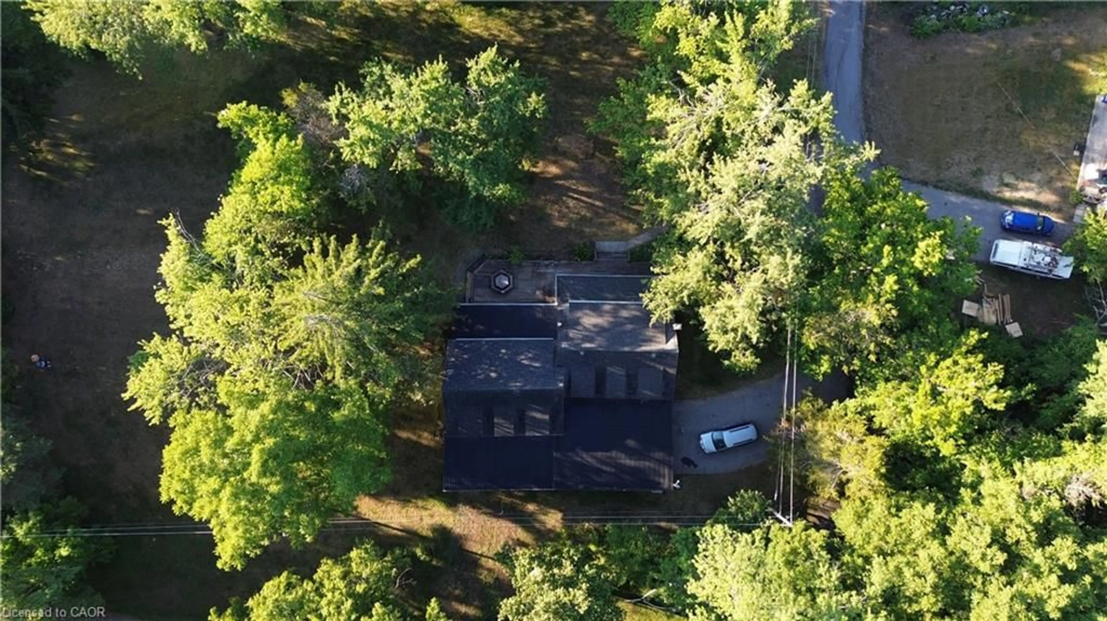 A pic from outside/outdoor area/front of a property/back of a property/a pic from drone, forest/trees view for 84 Cliff Way, Stirling Ontario K0K 3K0