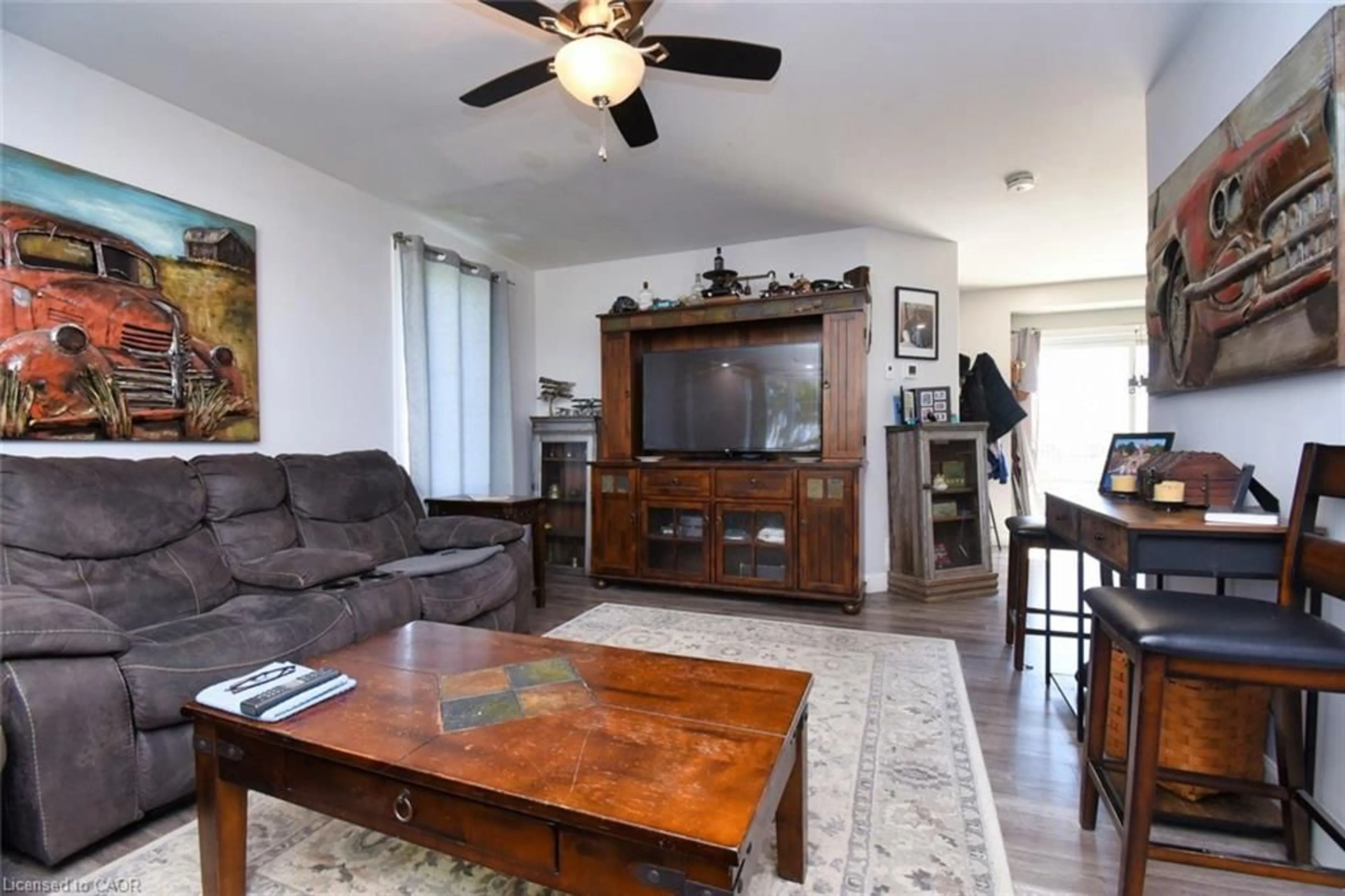 Living room with furniture, wood/laminate floor for 1364 Thompson Rd, Villa Nova Ontario N0E 1Y0