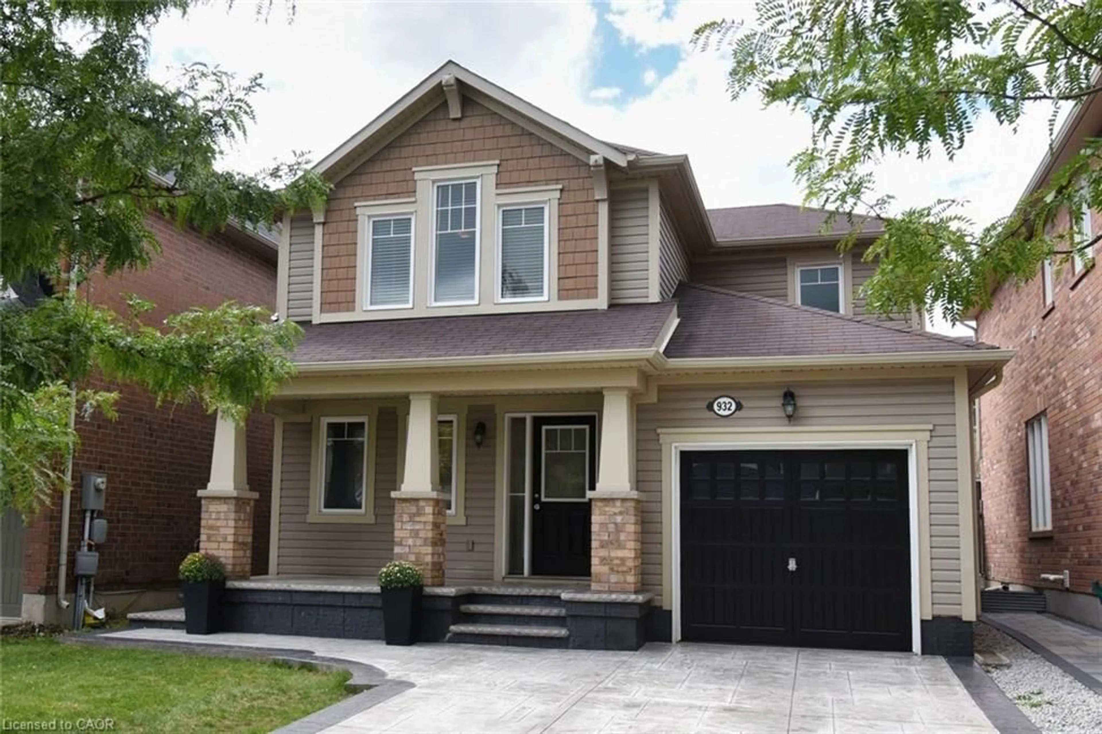 Home with brick exterior material, street for 932 Rigo Cross, Milton Ontario L9T 8C6
