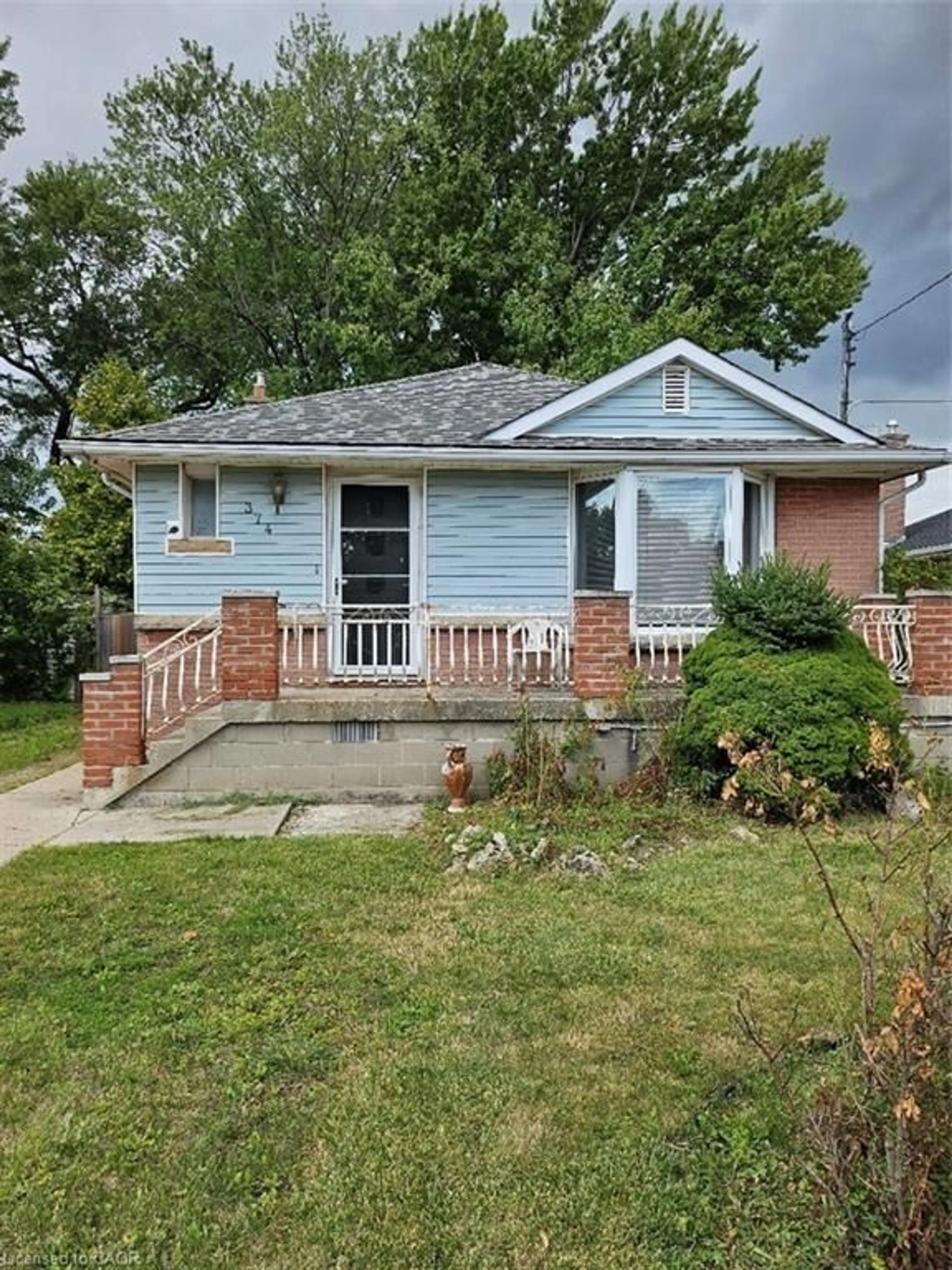 Home with brick exterior material, street for 374 East 13th St, Hamilton Ontario L9A 4A1