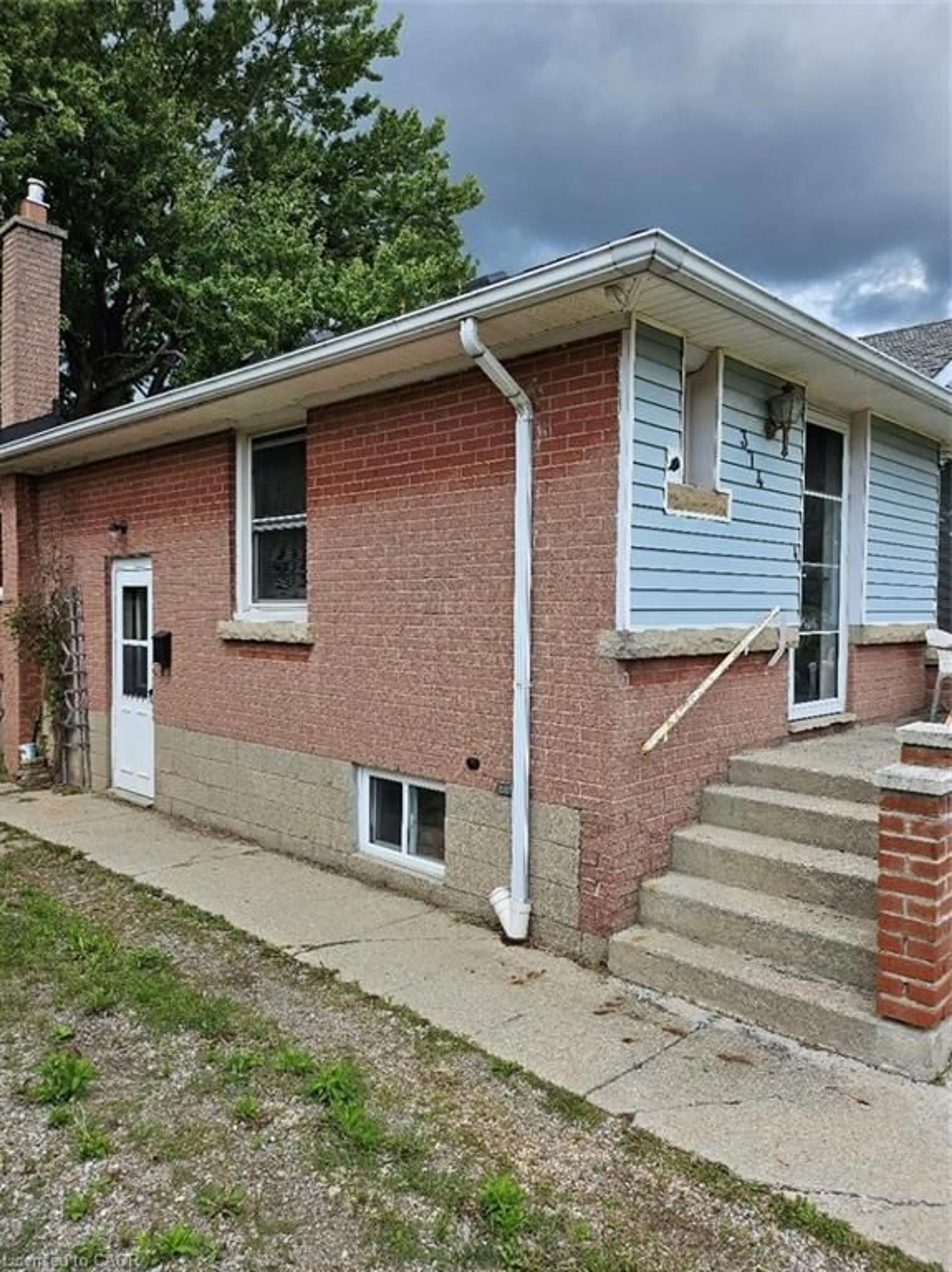 Home with brick exterior material, street for 374 East 13th St, Hamilton Ontario L9A 4A1