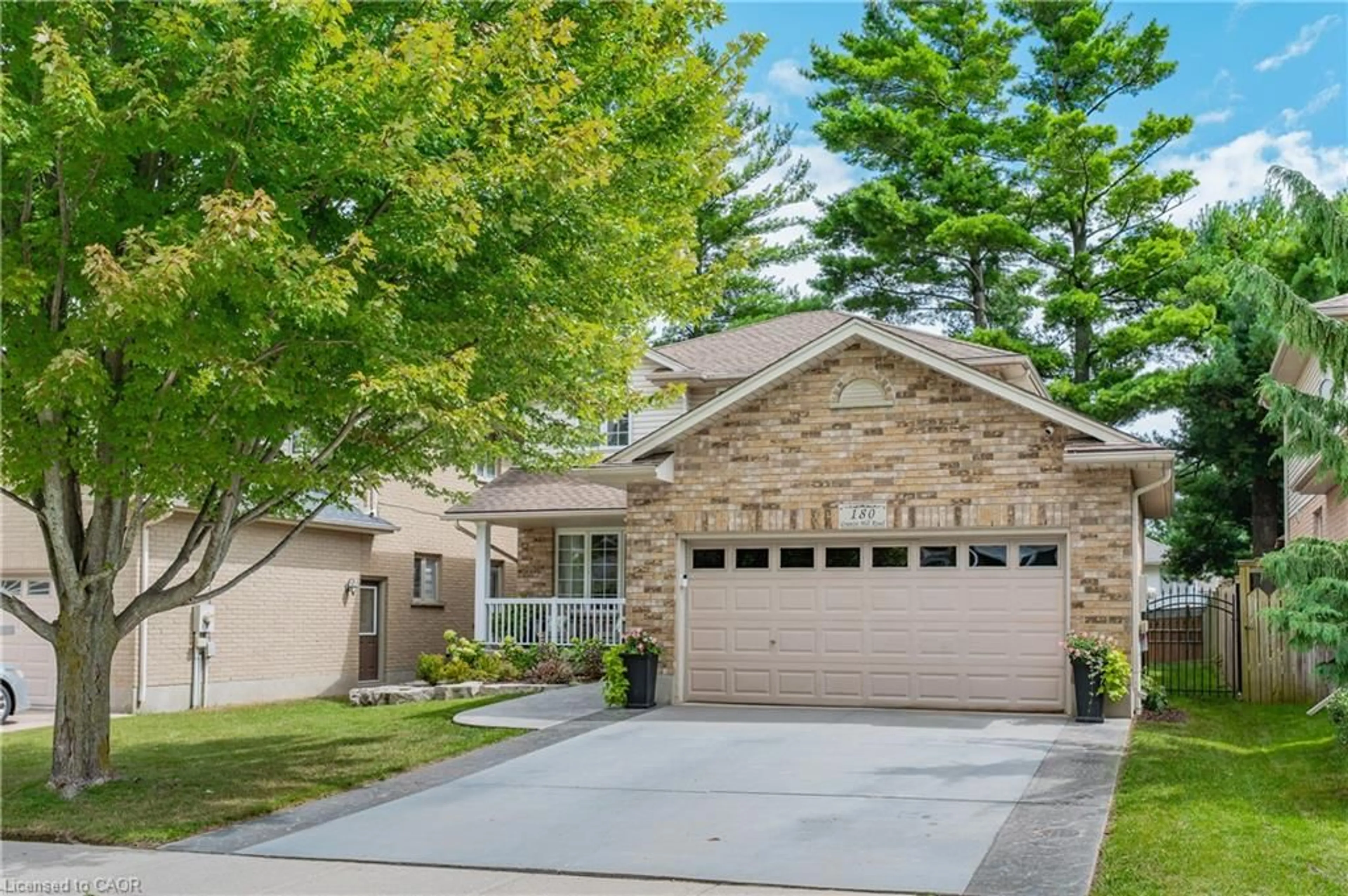 Home with brick exterior material, street for 180 Granite Hill Dr, Cambridge Ontario N1T 2A6