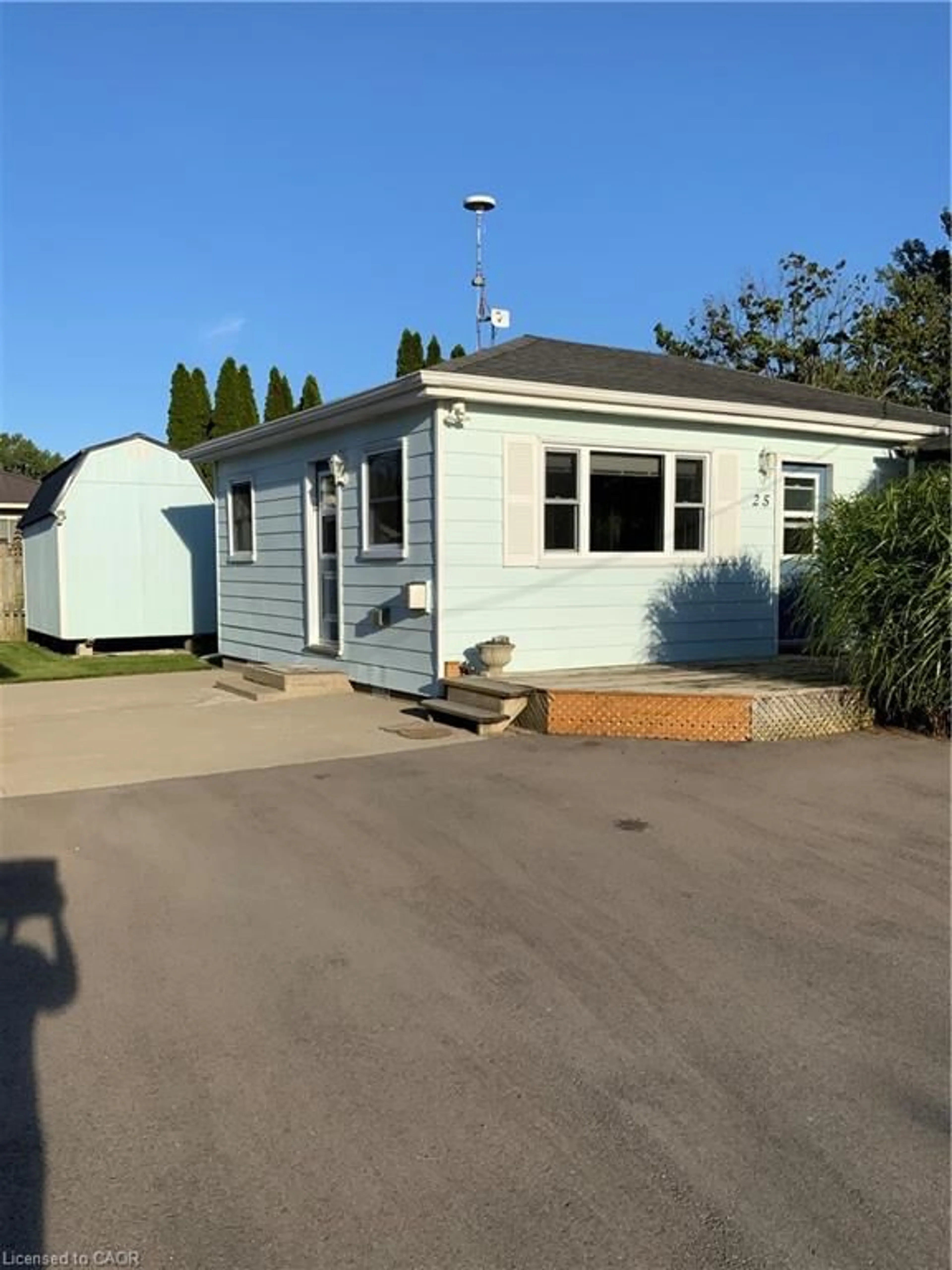 A pic from outside/outdoor area/front of a property/back of a property/a pic from drone, street for 25 First St, Long Point Ontario N0E 1M0