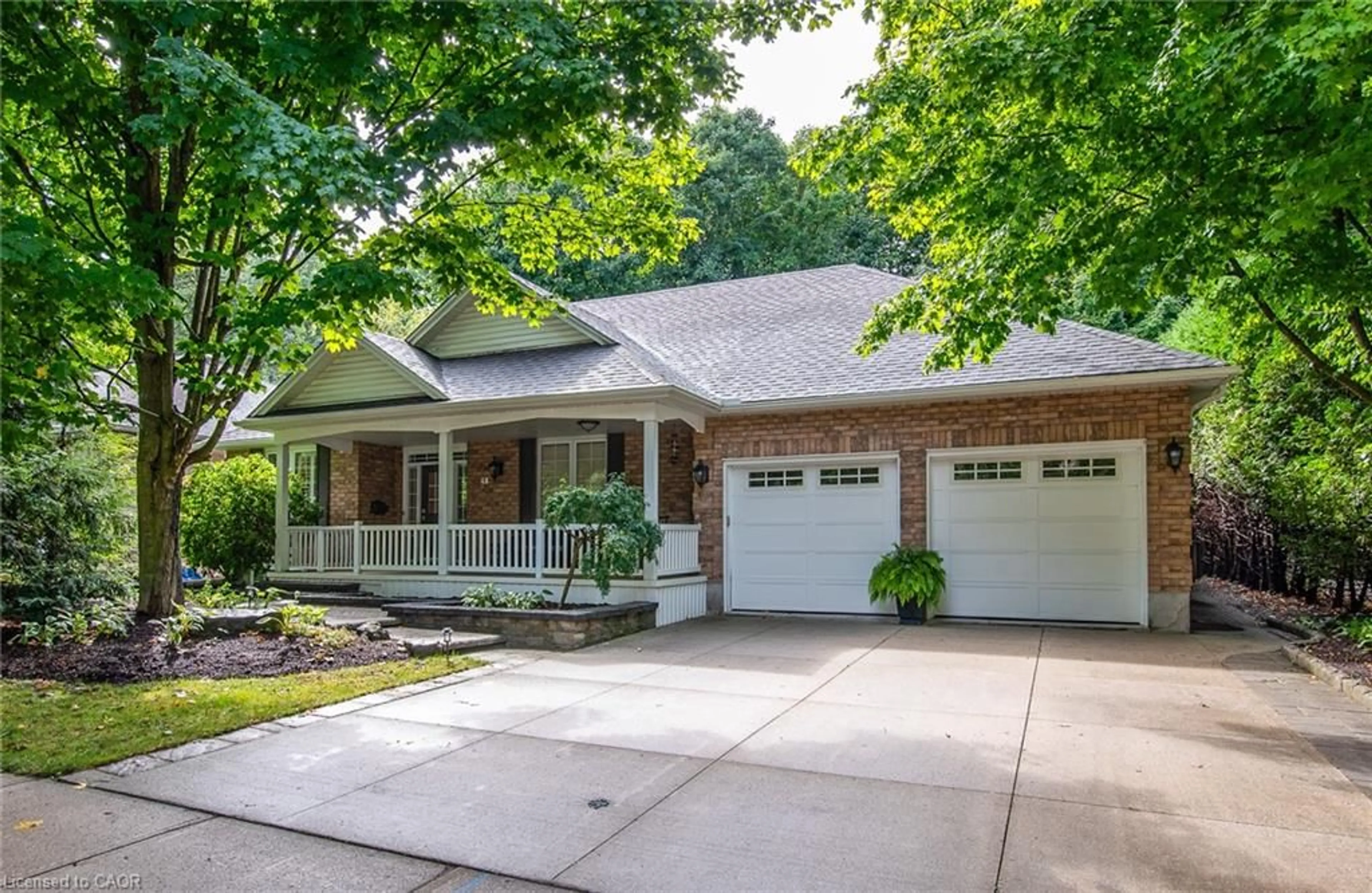 Home with brick exterior material, street for 48 Pintail Dr, Elmira Ontario N3B 3K9
