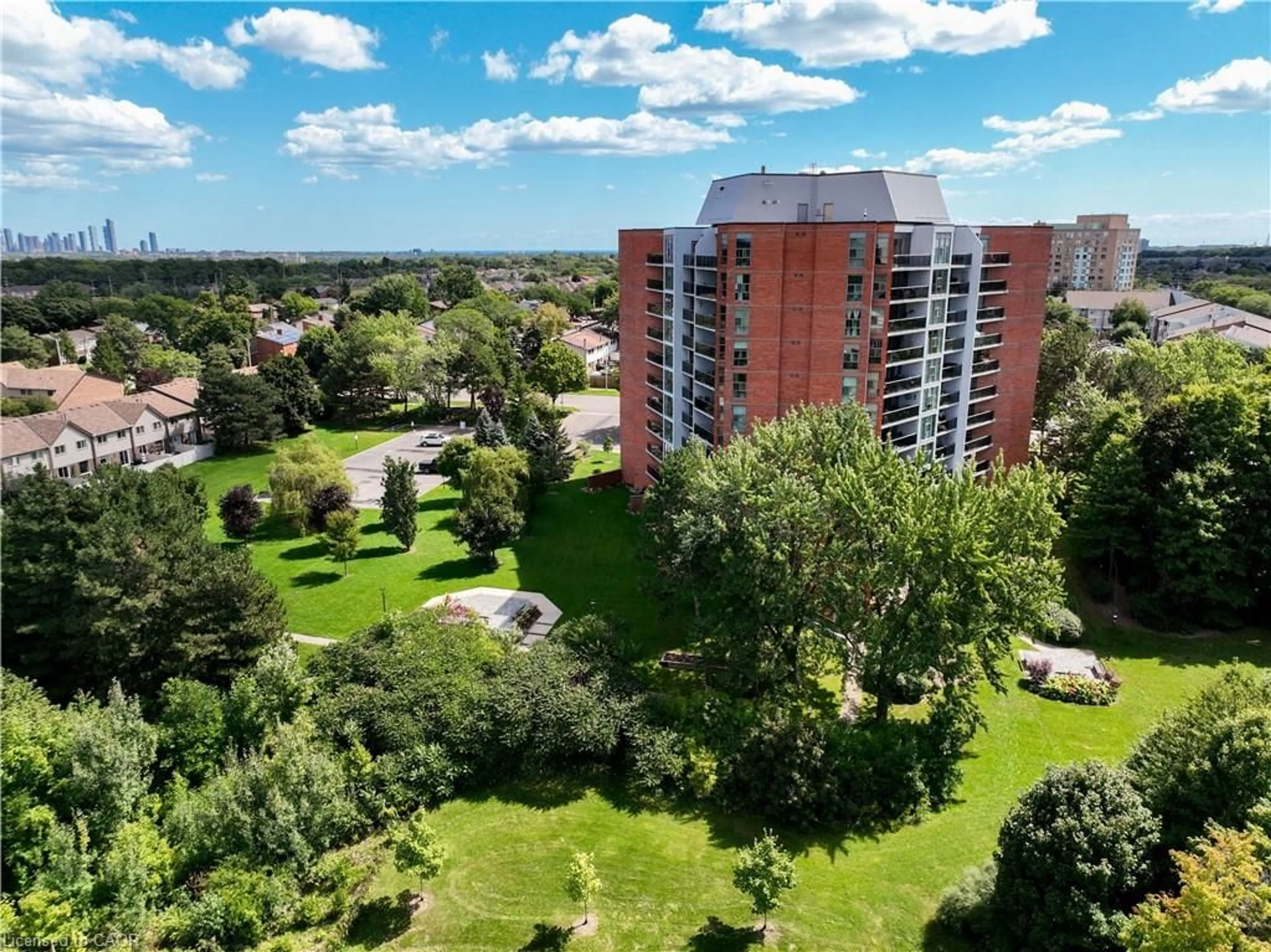 A pic from outside/outdoor area/front of a property/back of a property/a pic from drone, city buildings view from balcony for 2665 Windwood Dr, Mississauga Ontario L5N 2P2