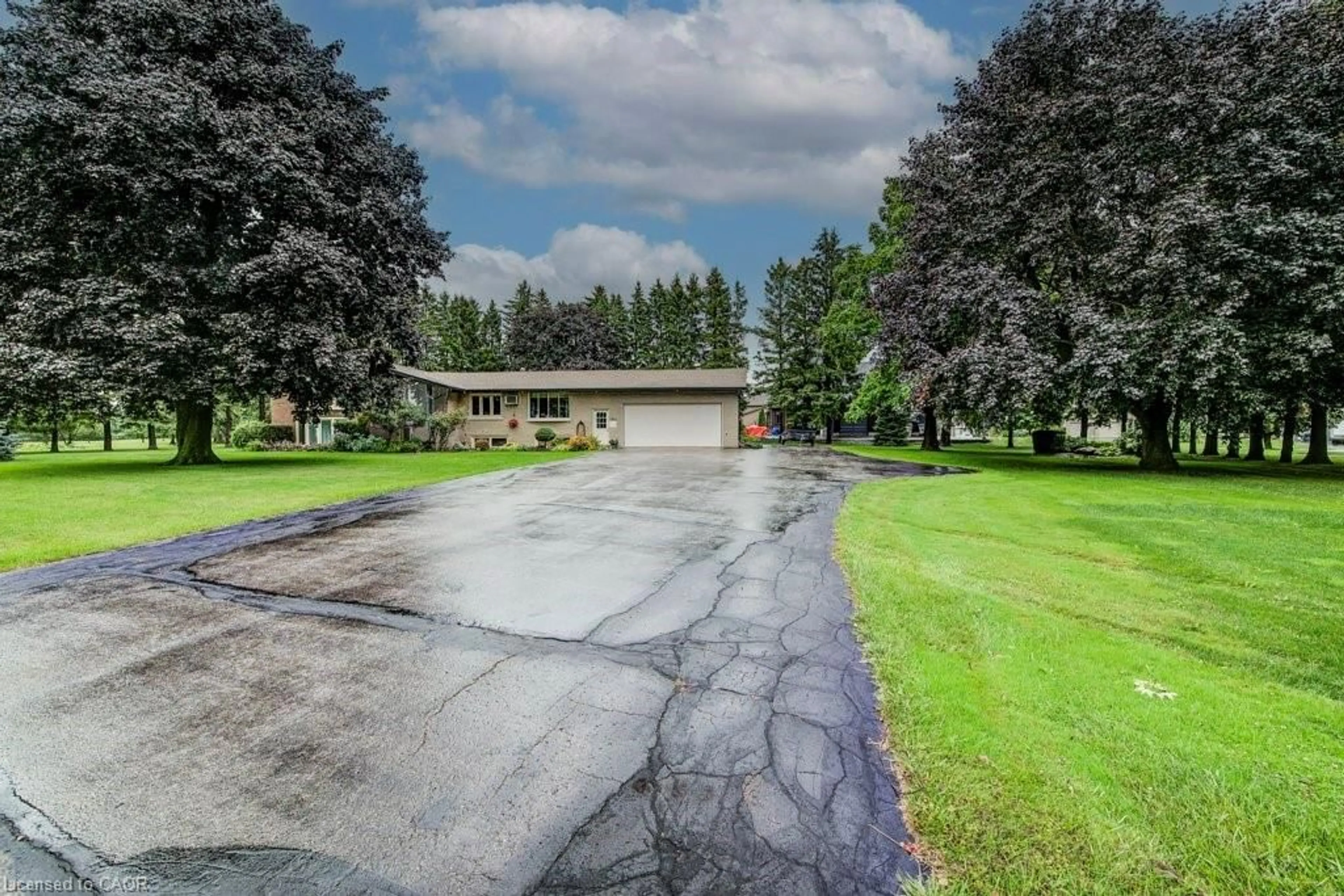 A pic from outside/outdoor area/front of a property/back of a property/a pic from drone, street for 8719 Road 164, Gowanstown Ontario N0G 1Y0