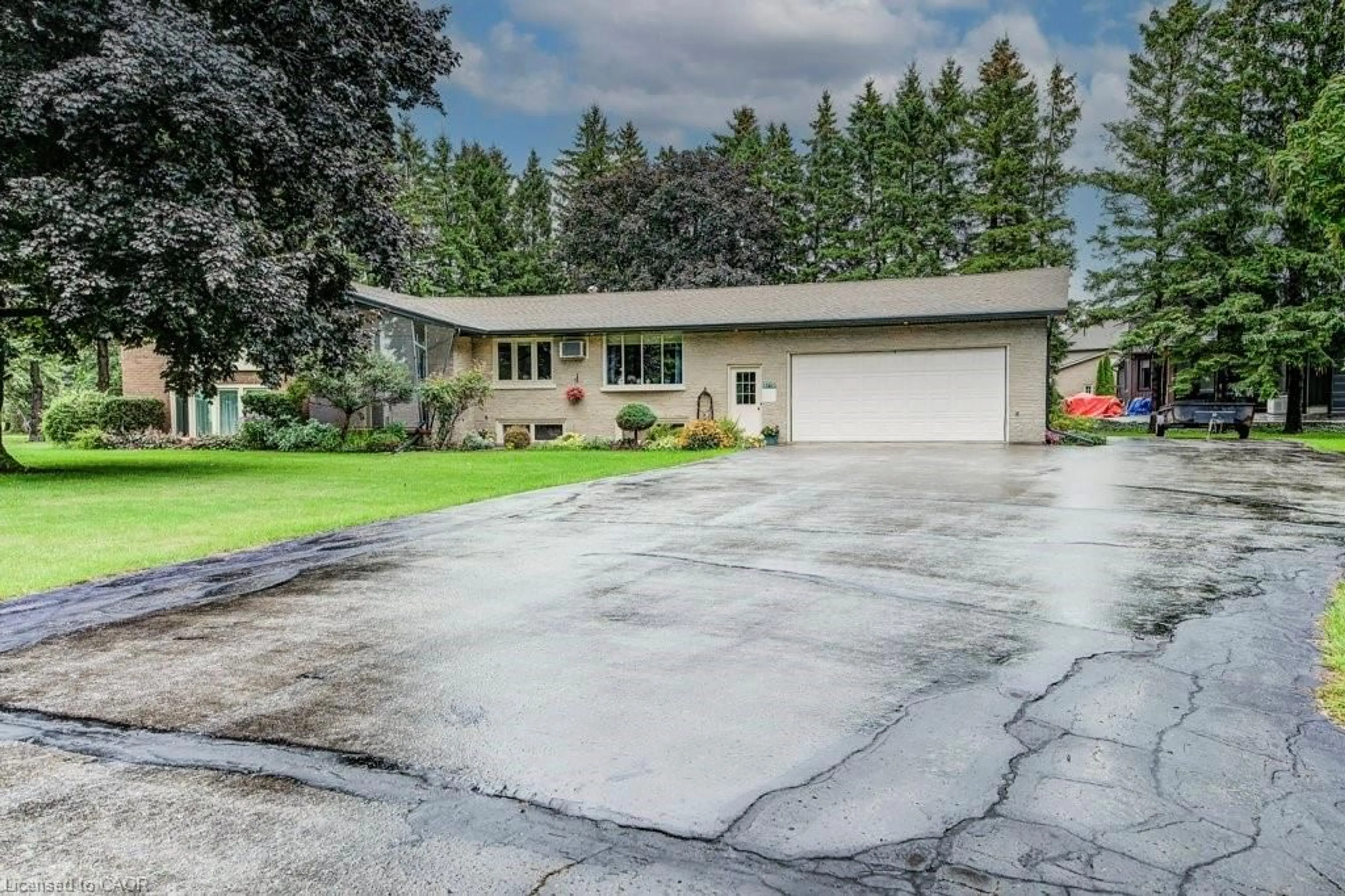 Home with vinyl exterior material, street for 8719 Road 164, Gowanstown Ontario N0G 1Y0