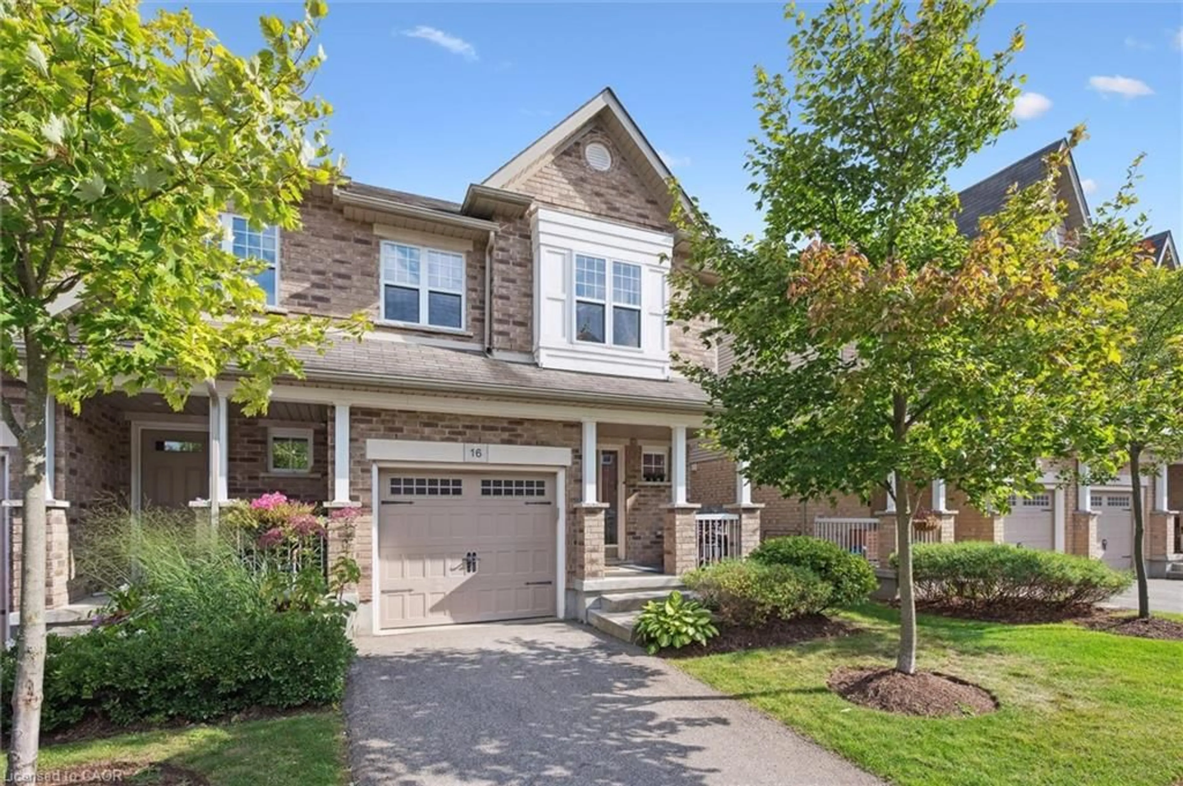 Home with brick exterior material, street for 167 Arkell Road Rd #16, Guelph Ontario N1L 0J9