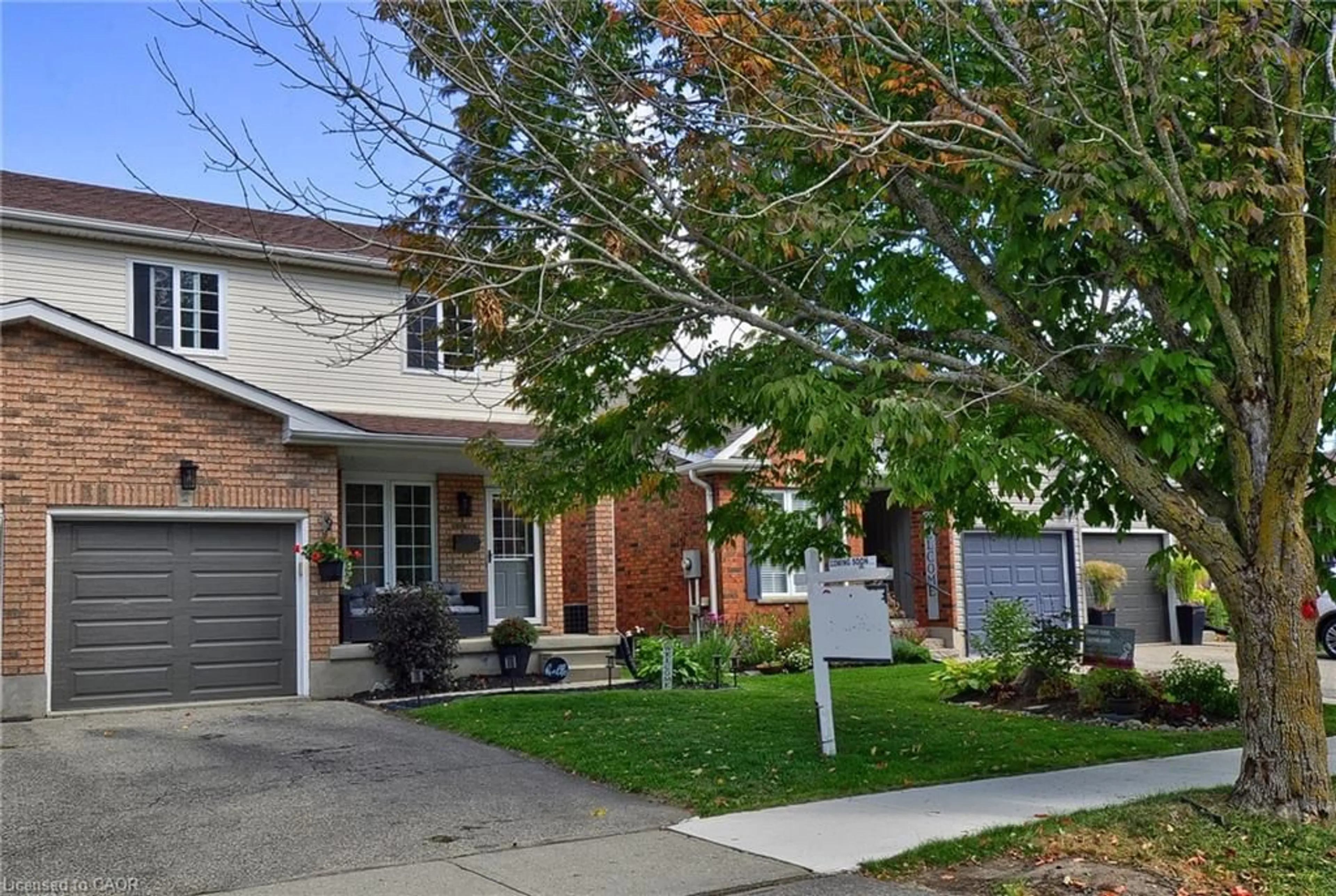 Home with brick exterior material, street for 209B Inverhuron Cres, Waterloo Ontario N2V 2H7