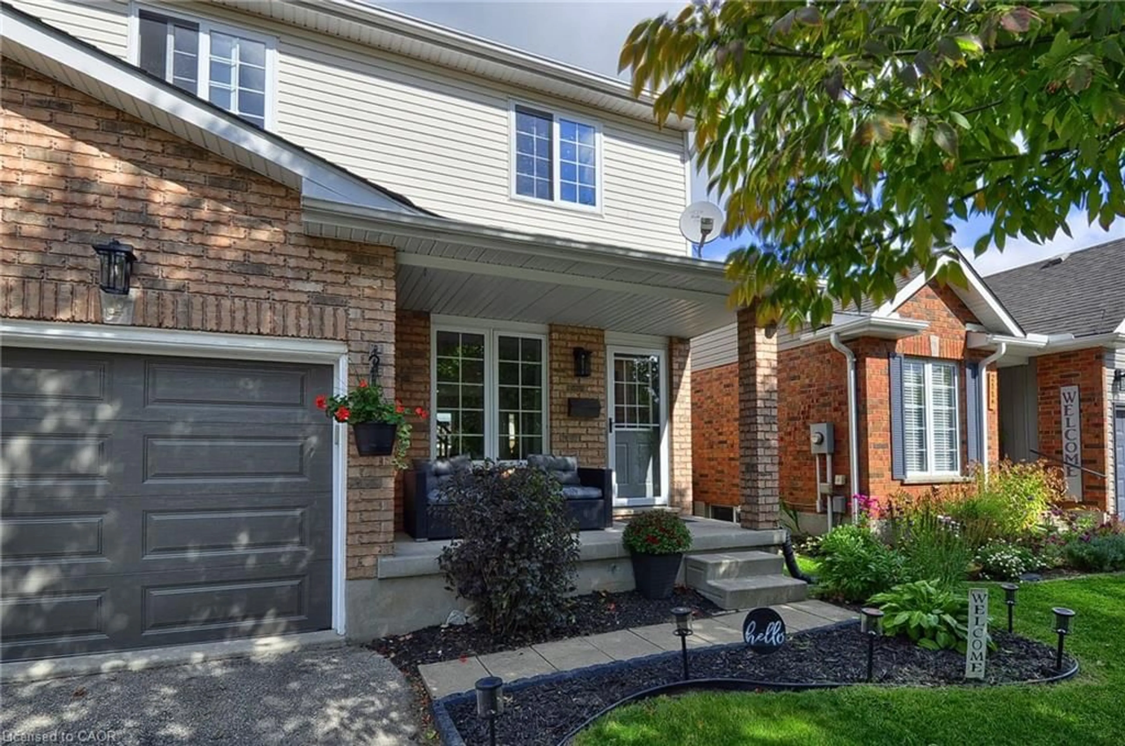 Home with brick exterior material, street for 209B Inverhuron Cres, Waterloo Ontario N2V 2H7