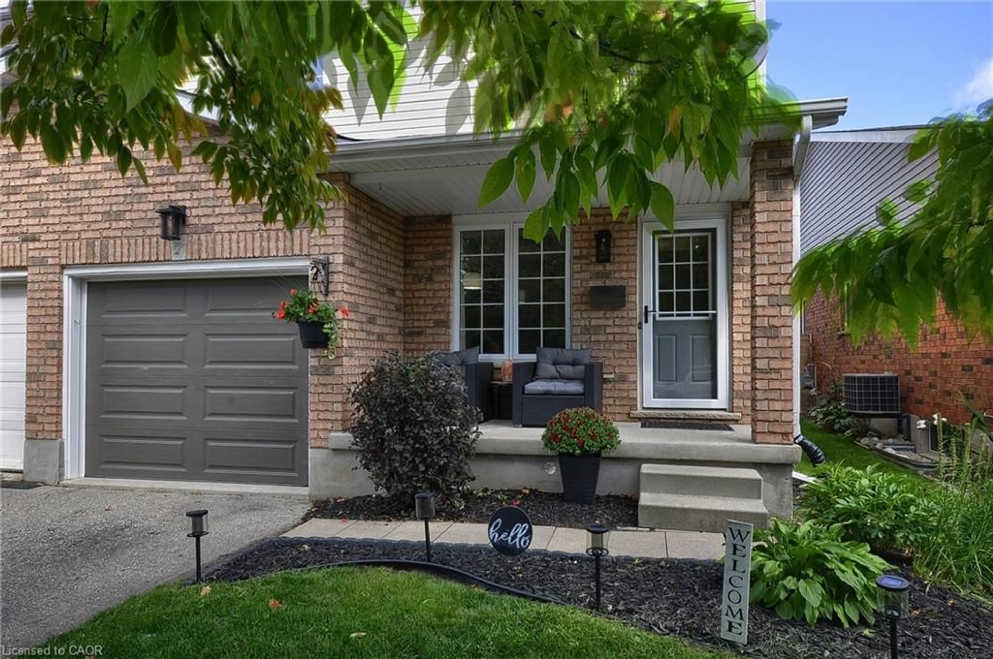Home with brick exterior material, street for 209B Inverhuron Cres, Waterloo Ontario N2V 2H7