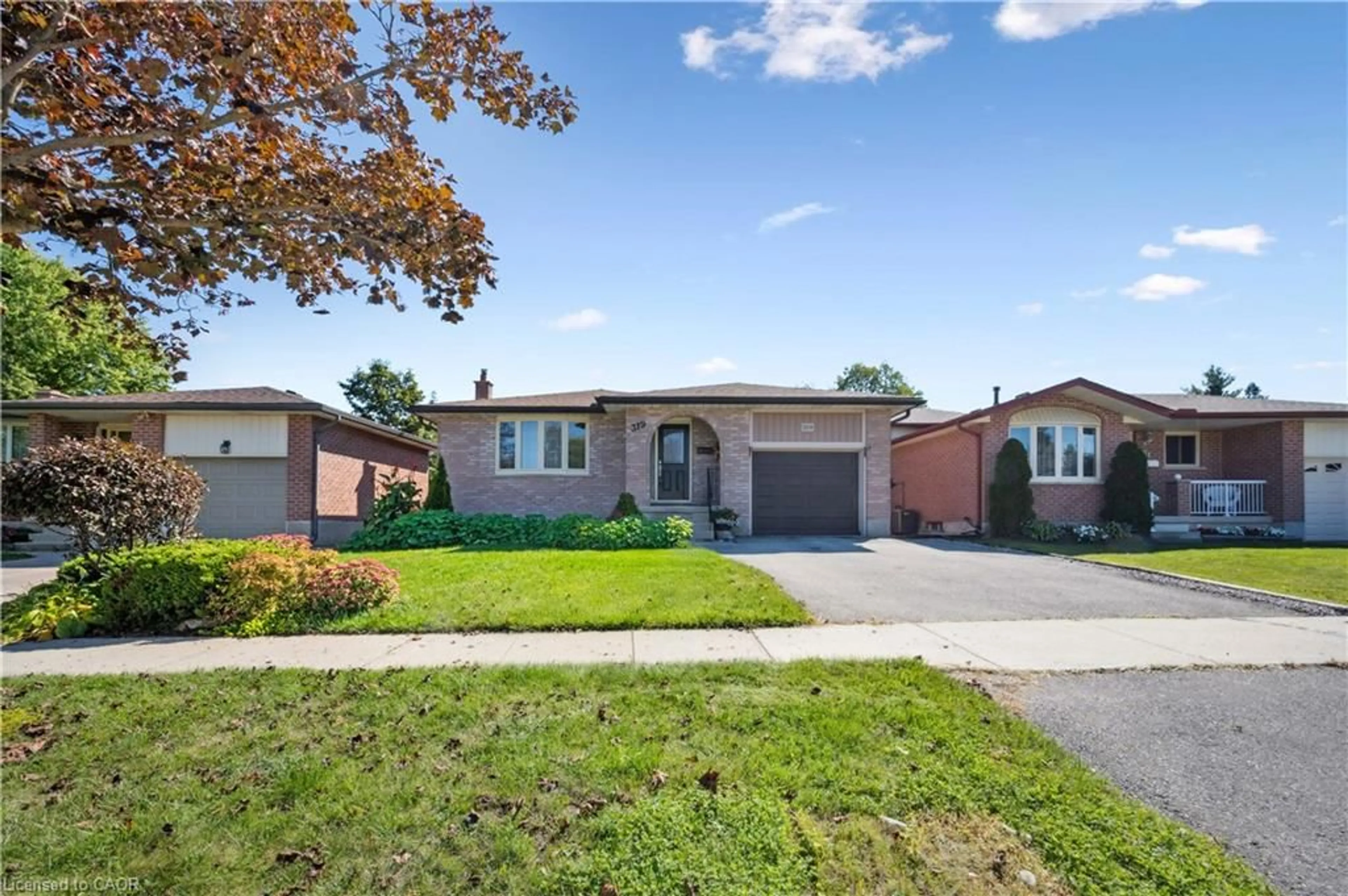 Home with brick exterior material, street for 319 Conservation Dr, Waterloo Ontario N2V 1V2