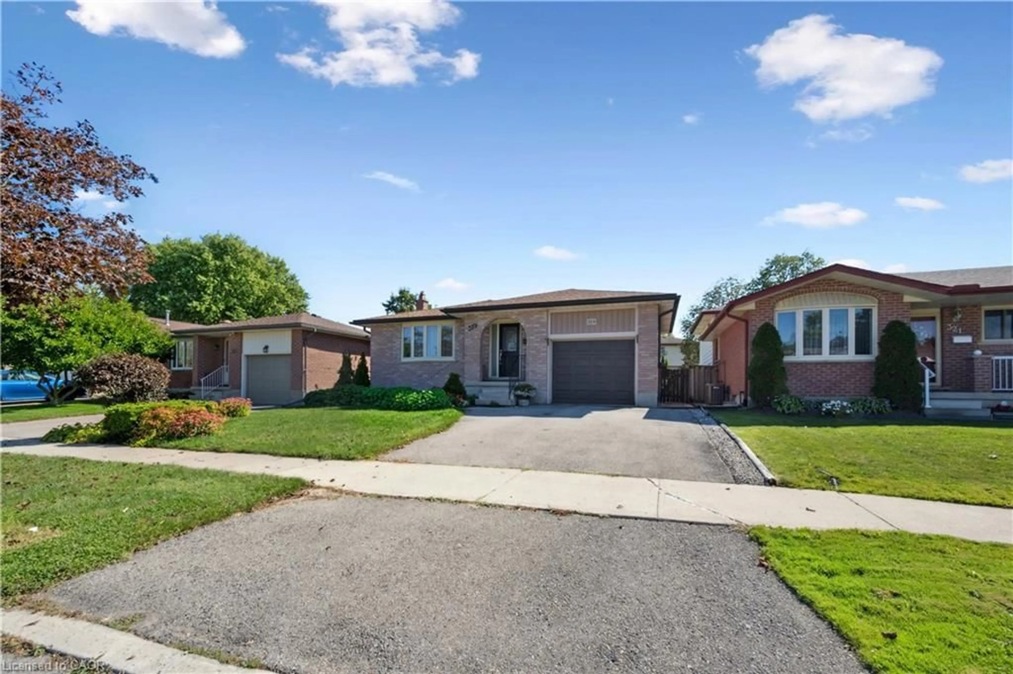 Home with brick exterior material, street for 319 Conservation Dr, Waterloo Ontario N2V 1V2