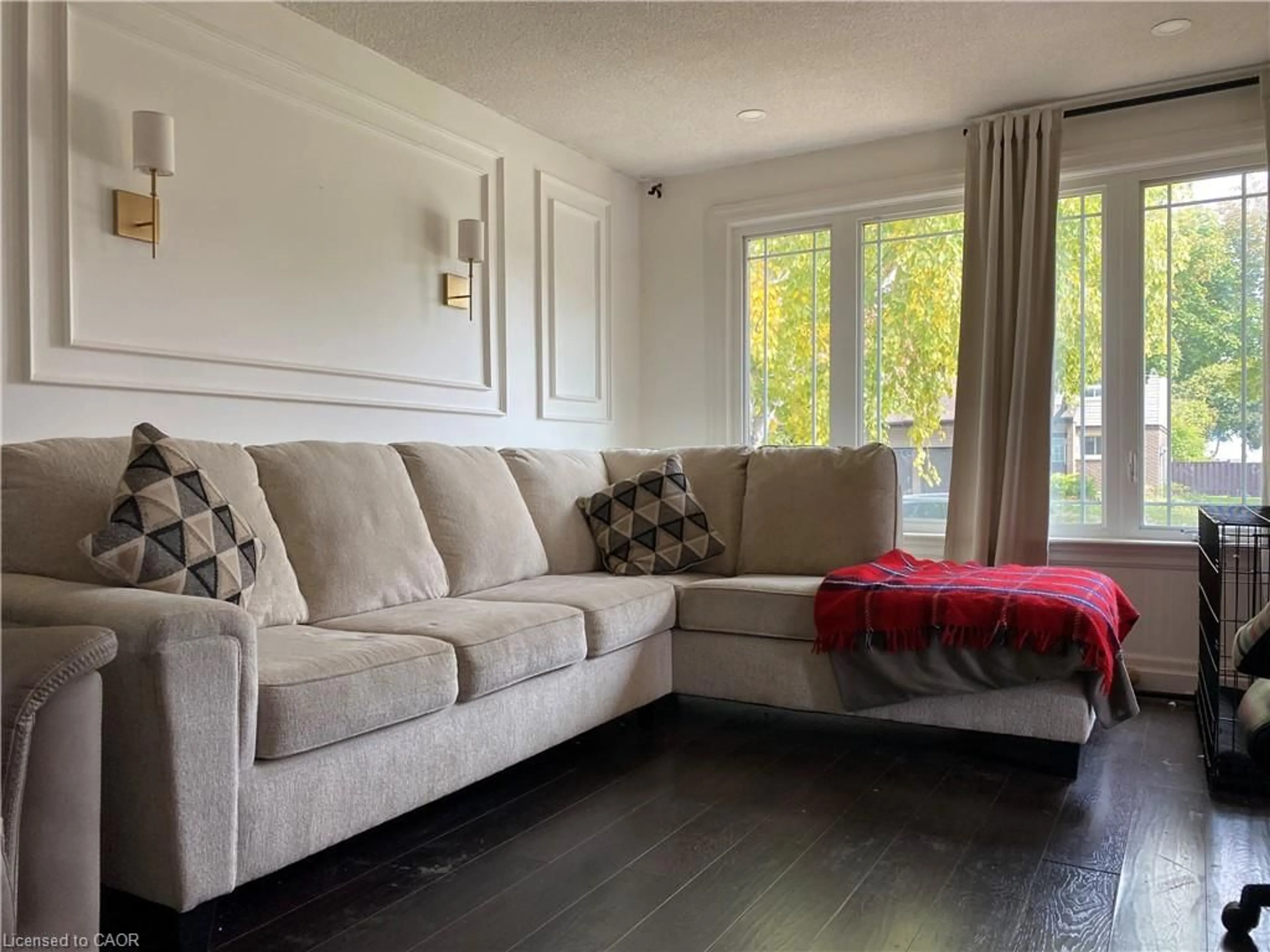 Living room with furniture, wood/laminate floor for 24 Queenslea Dr, Hamilton Ontario L8W 1G1