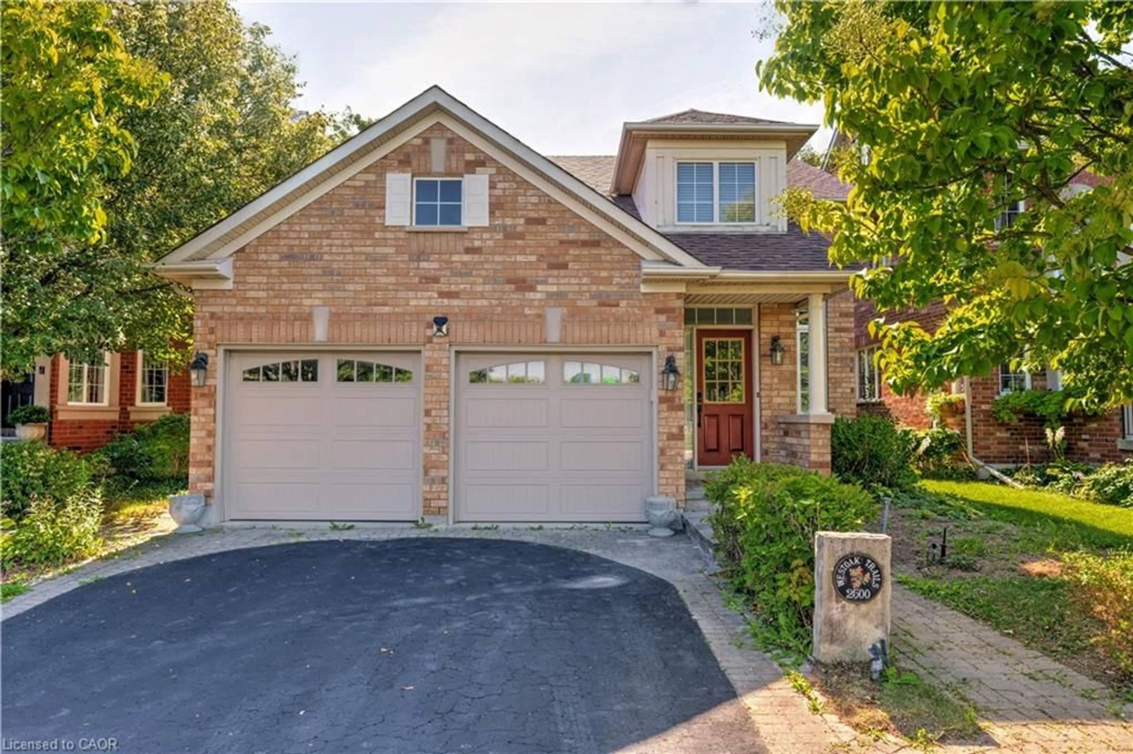 Home with brick exterior material, street for 2500 Westoak Trails Blvd, Oakville Ontario L6M 3S1
