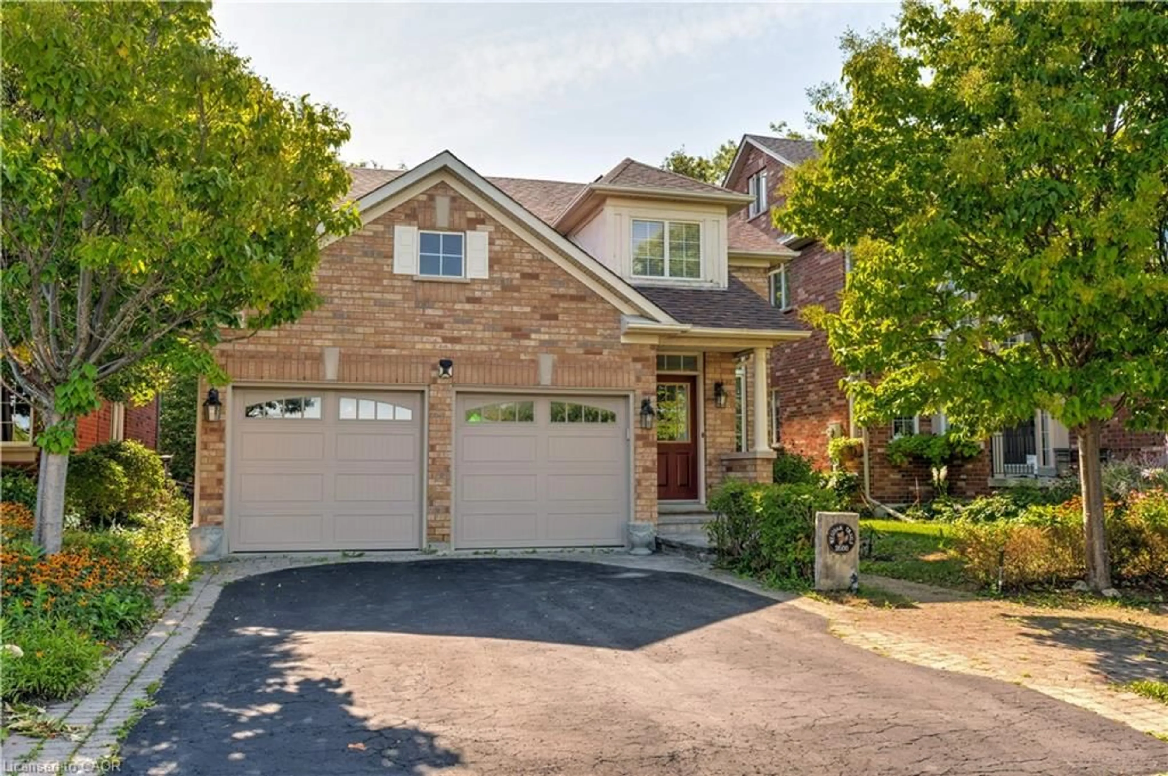 Home with brick exterior material, street for 2500 Westoak Trails Blvd, Oakville Ontario L6M 3S1