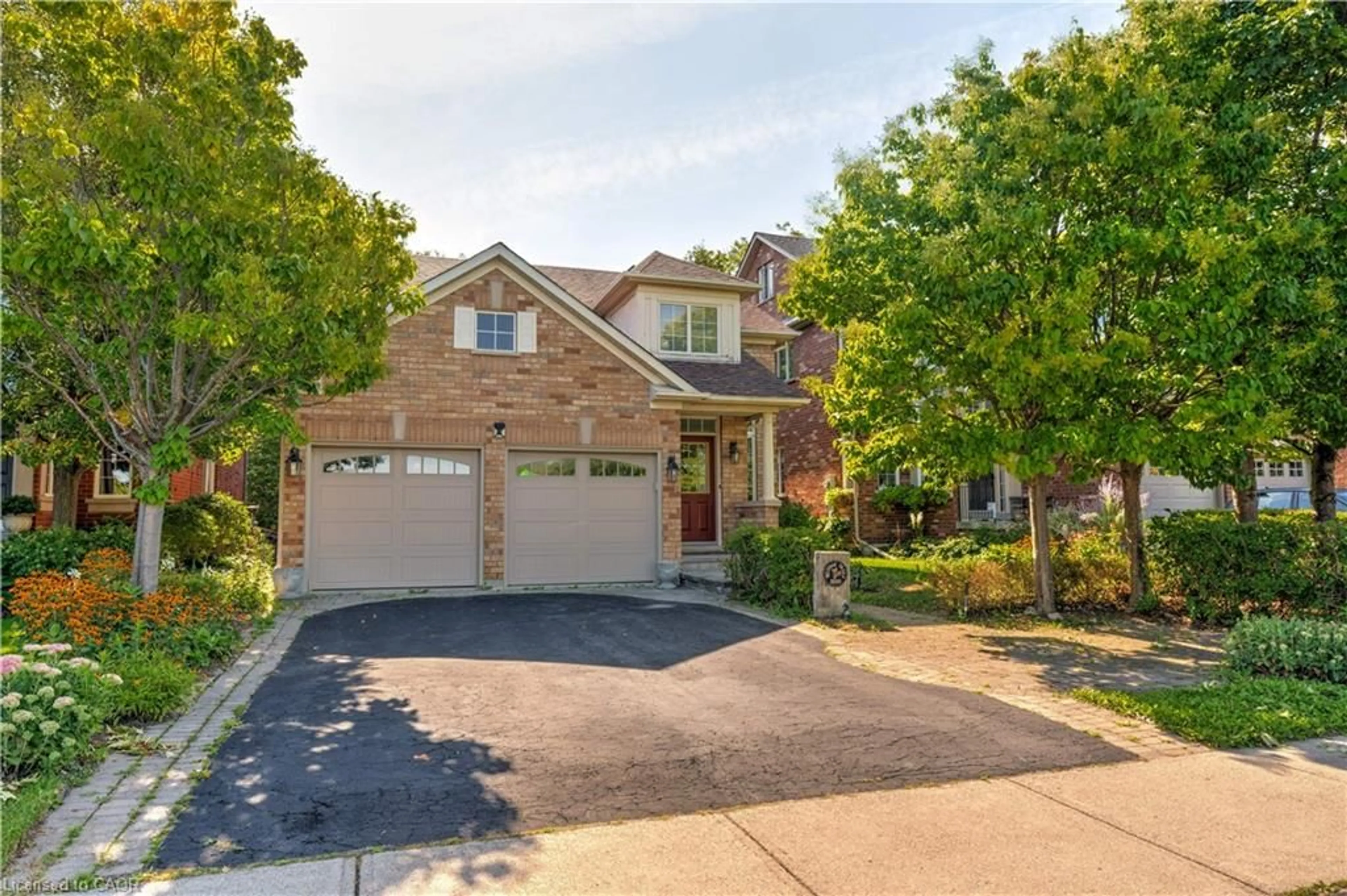 Home with brick exterior material, street for 2500 Westoak Trails Blvd, Oakville Ontario L6M 3S1