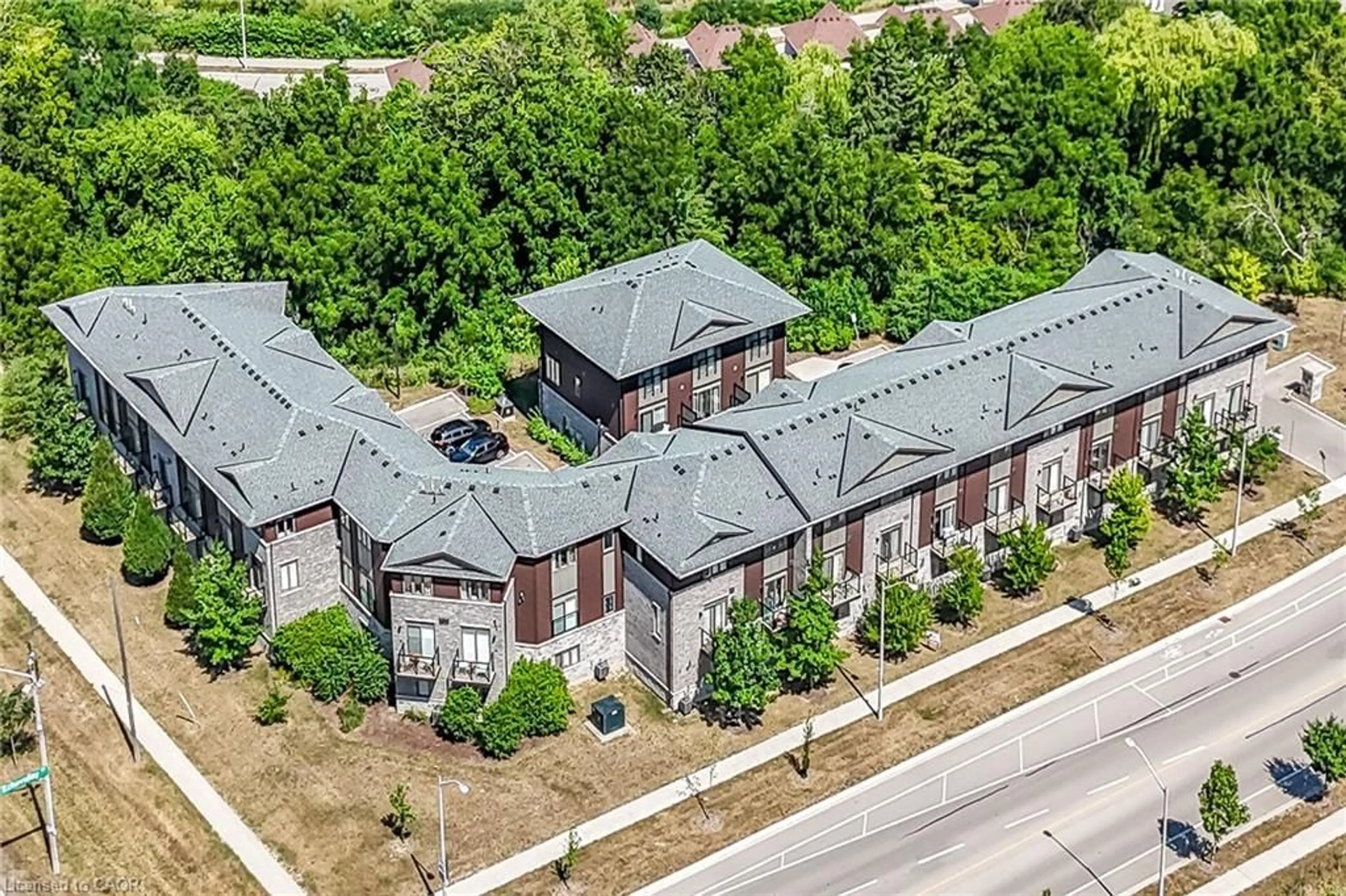 A pic from outside/outdoor area/front of a property/back of a property/a pic from drone, street for 23 Echovalley Dr #12, Stoney Creek Ontario L8J 0K4
