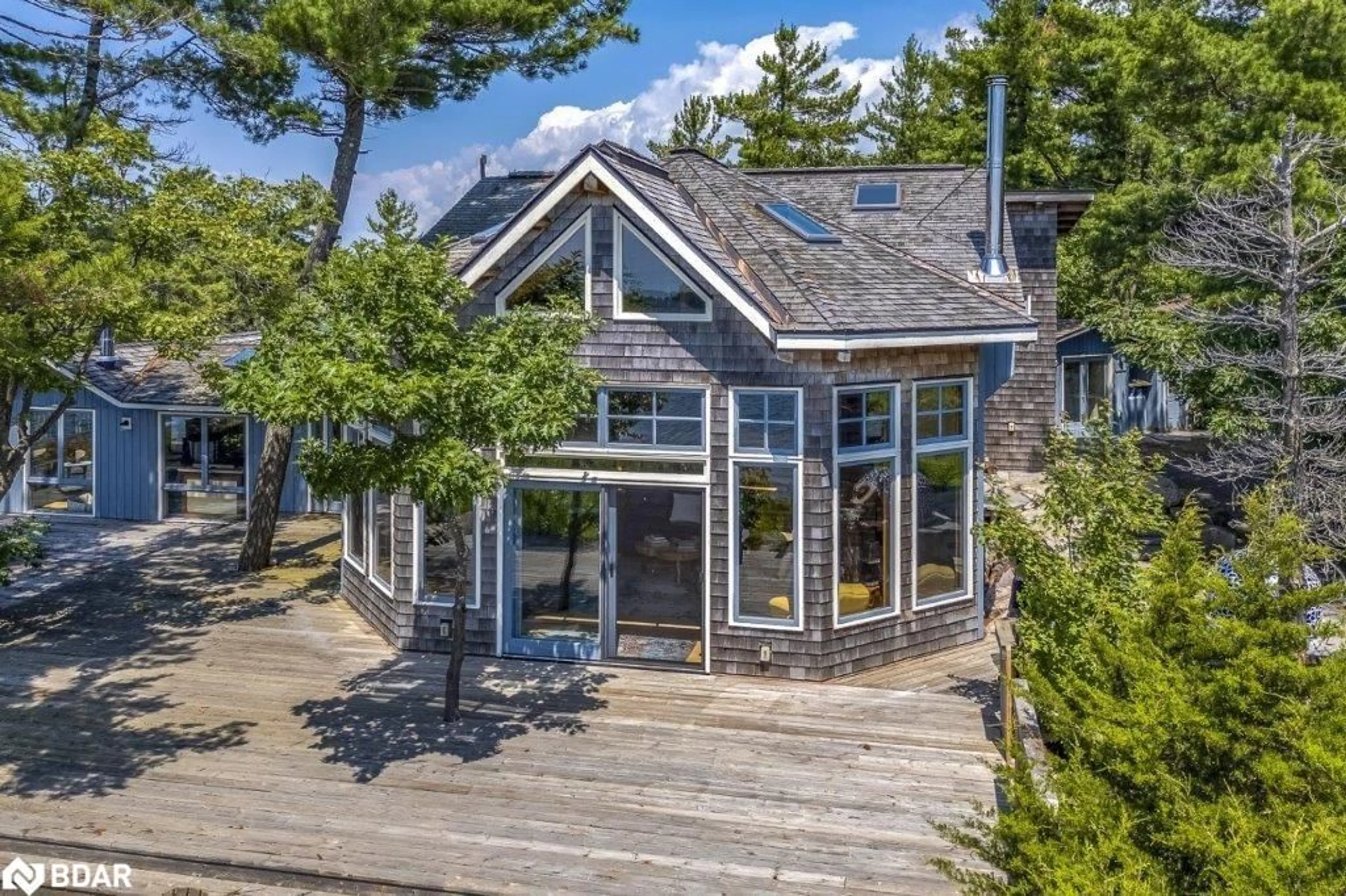 A pic from outside/outdoor area/front of a property/back of a property/a pic from drone, water/lake/river/ocean view for B433 Campbell Island, Parry Sound Ontario P0G 1G0
