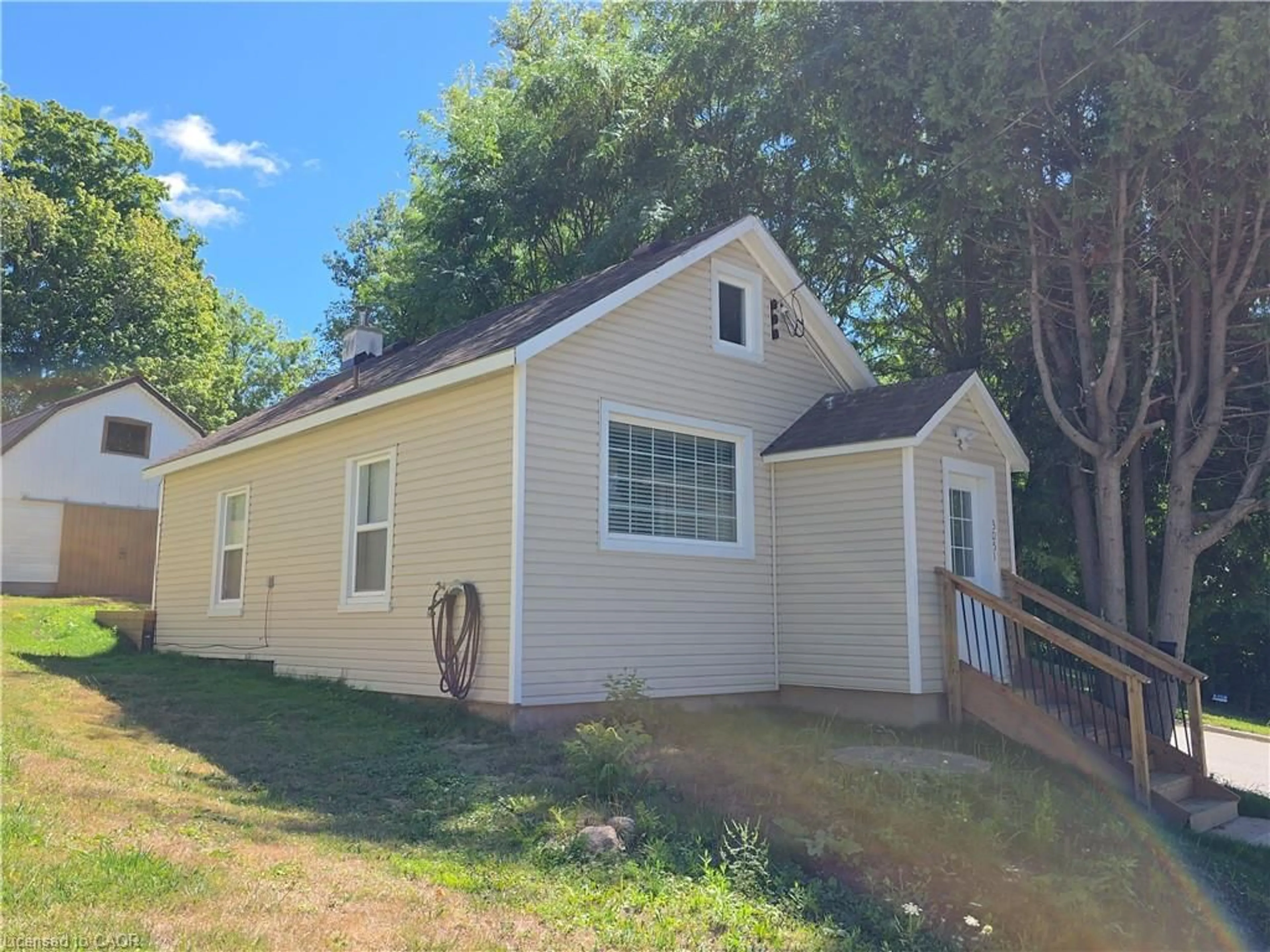 Home with vinyl exterior material, street for 3089 Patrick St, Fordwich Ontario N0G 1V0