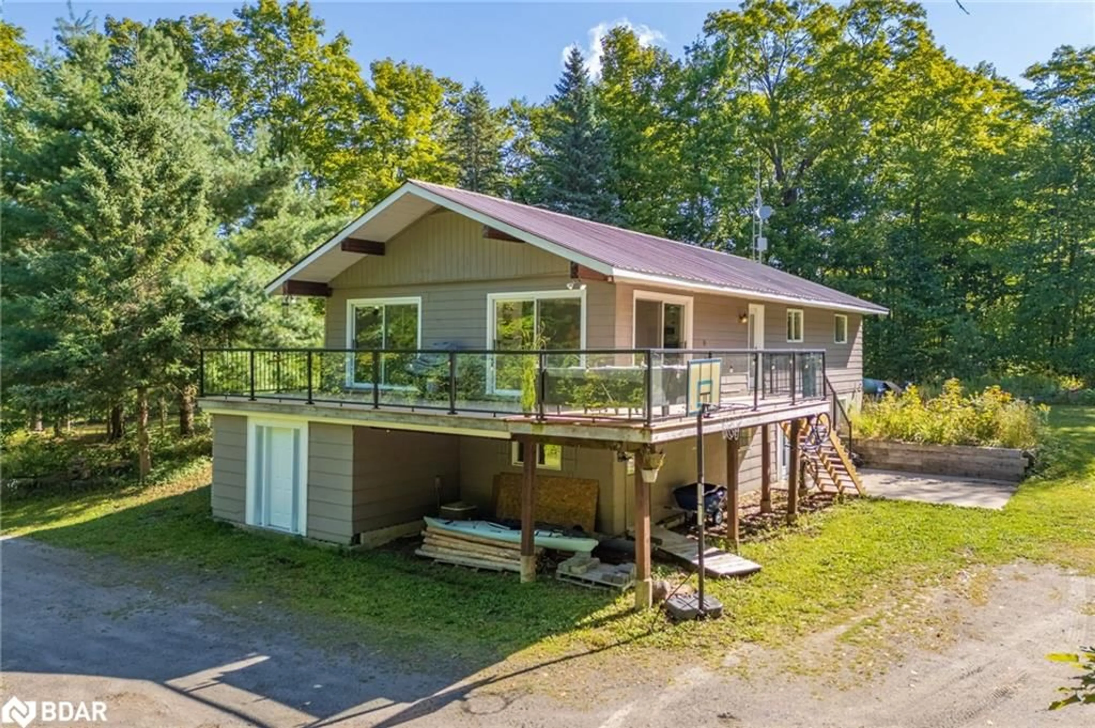 A pic from outside/outdoor area/front of a property/back of a property/a pic from drone, water/lake/river/ocean view for 1100 Mortimers Point Rd, Muskoka Lakes Ontario P0B 1J0