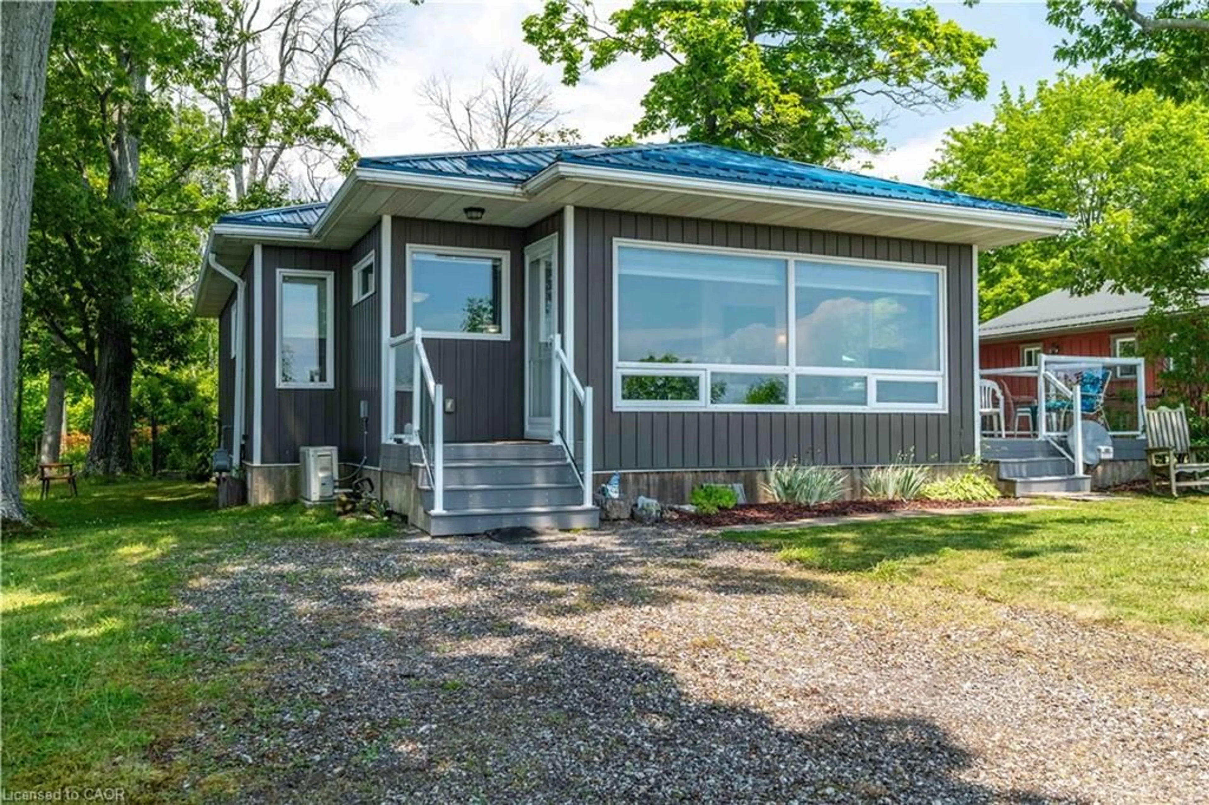 Home with vinyl exterior material, street for 2399 Lakeshore Rd, Dunnville Ontario N1A 2W8