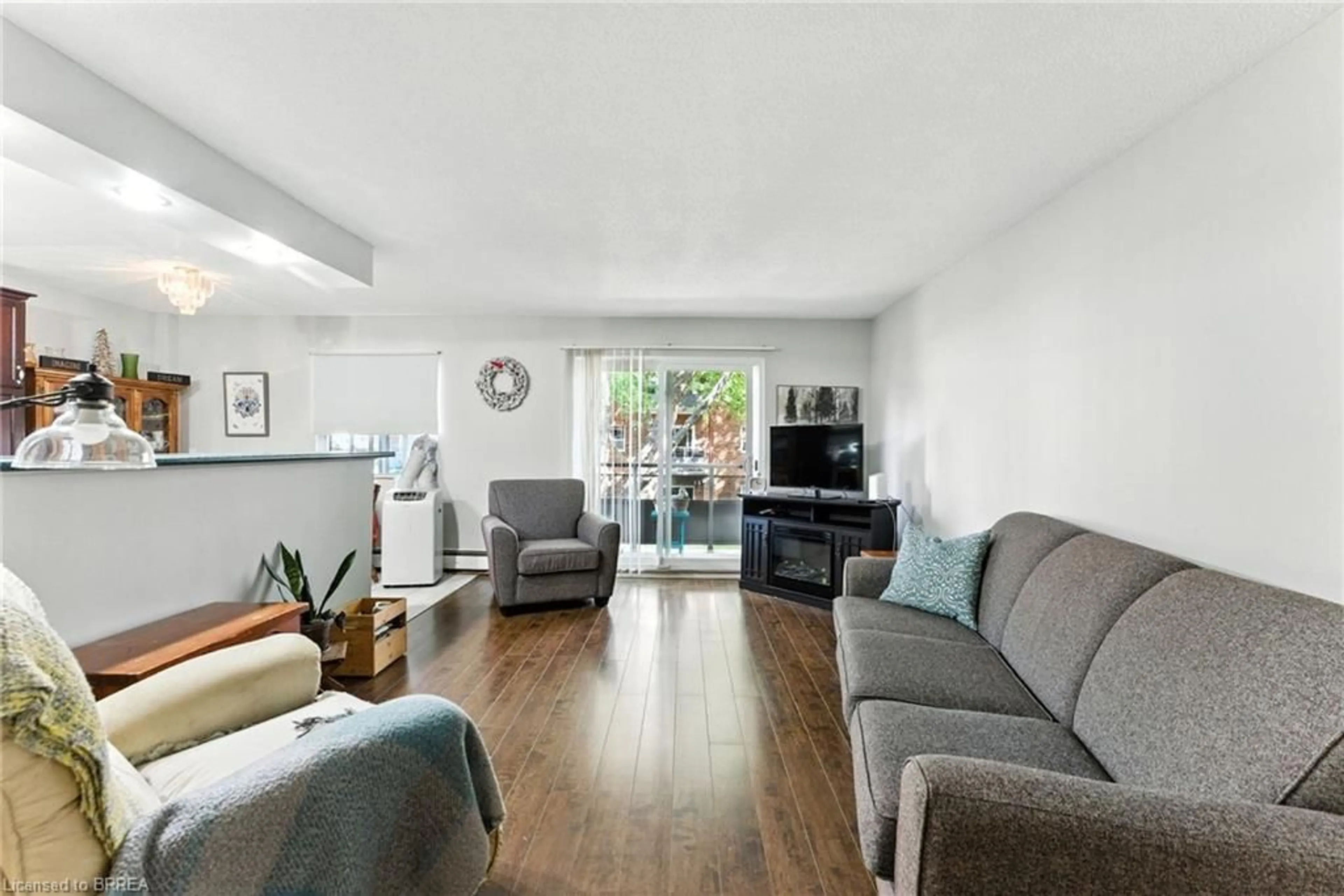 Living room with furniture, unknown for 612 Grey St #7, Brantford Ontario N3S 4Y1