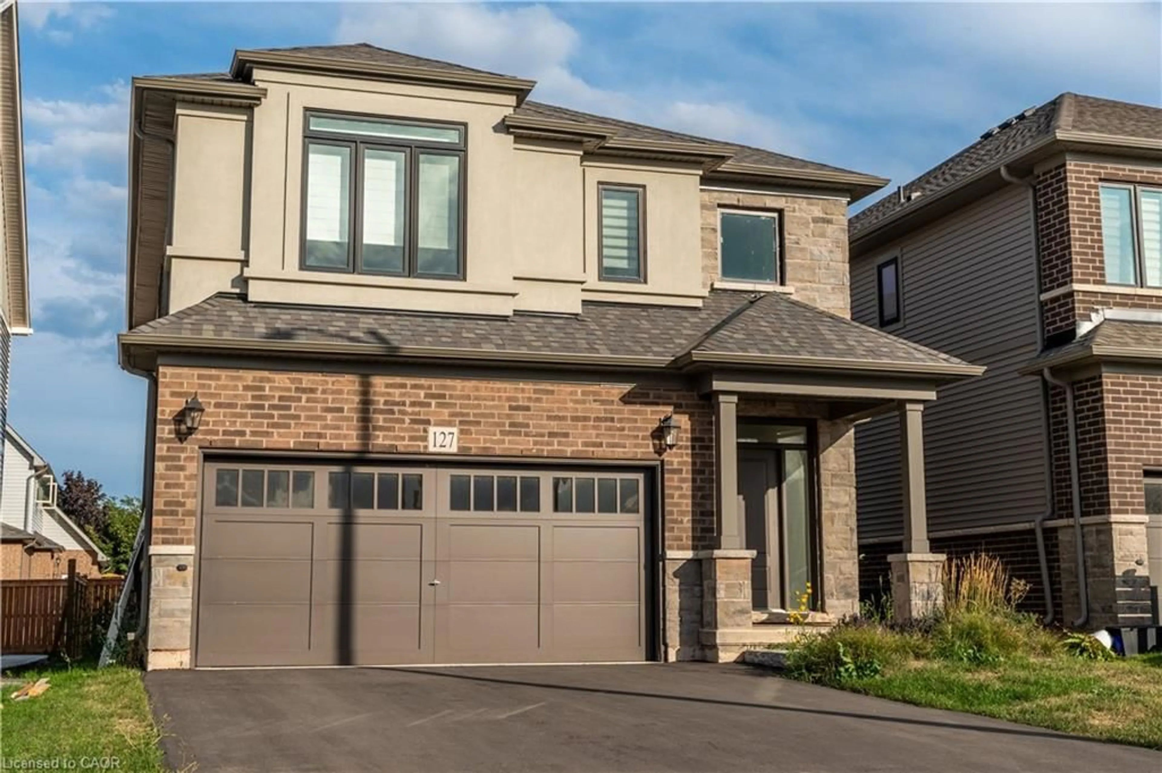 Home with brick exterior material, street for 127 Starfire Cres, Stoney Creek Ontario L8E 0K9