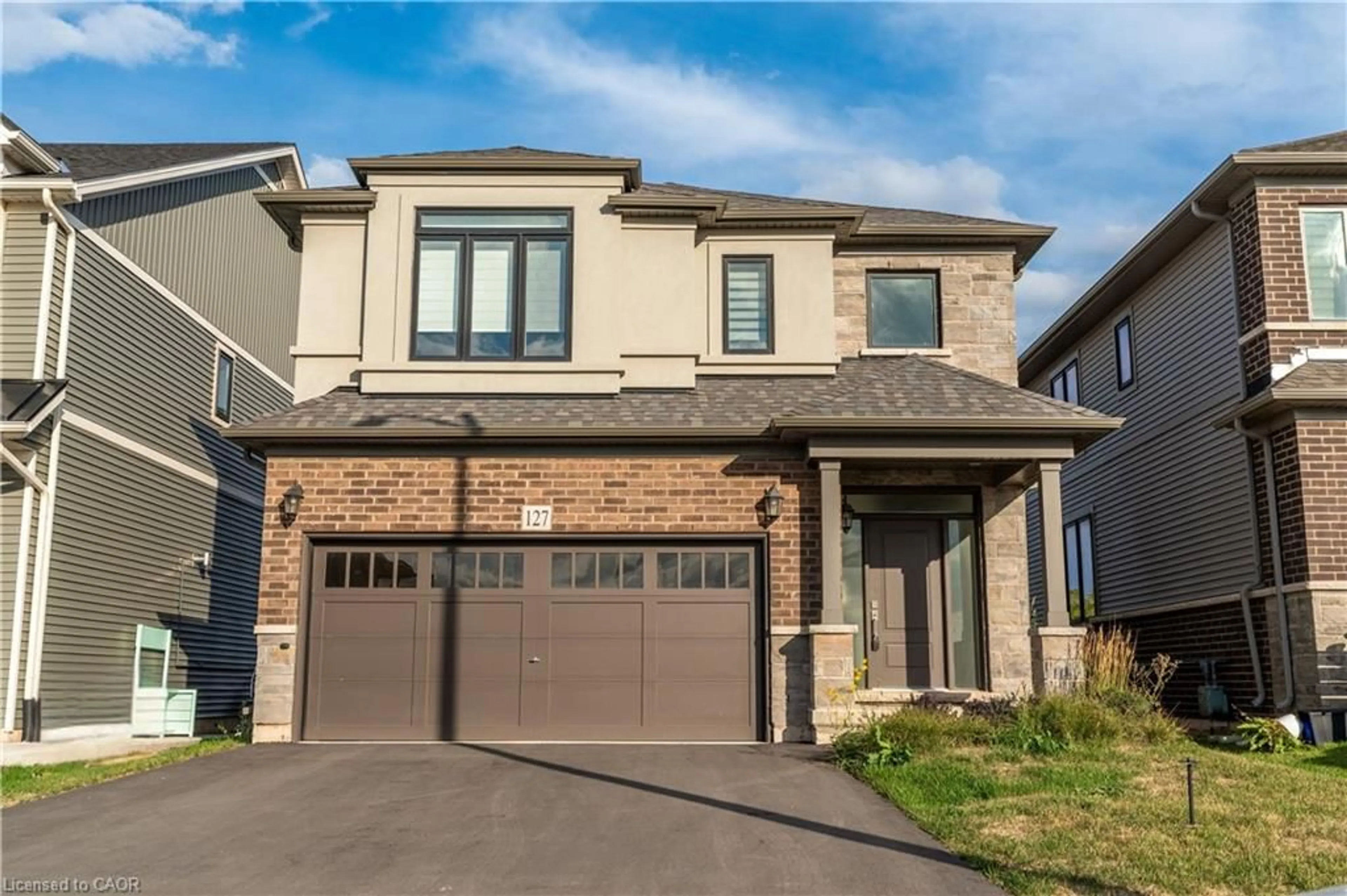 Home with brick exterior material, street for 127 Starfire Cres, Stoney Creek Ontario L8E 0K9
