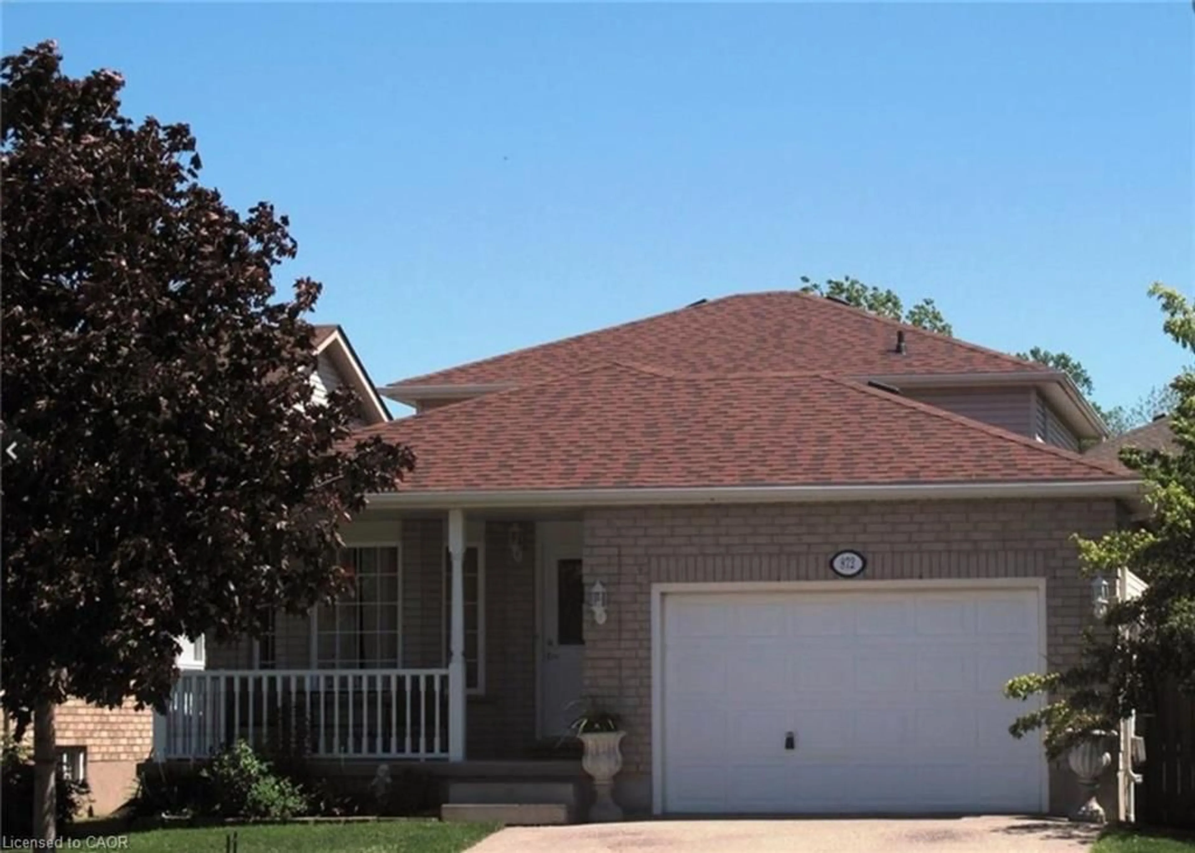 Home with vinyl exterior material, street for 872 Paisley Rd, Guelph Ontario N1K 1V8