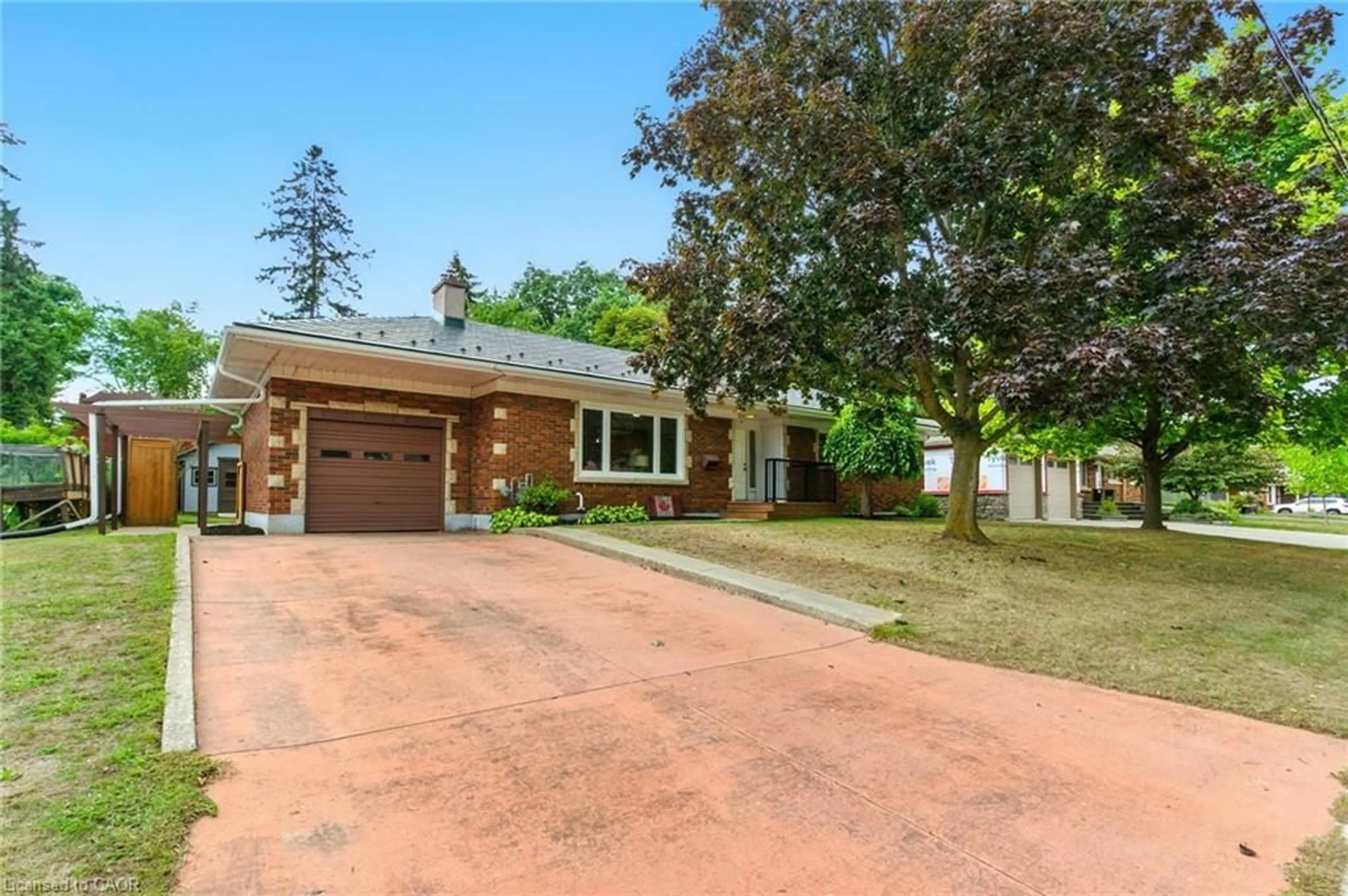 Home with brick exterior material, street for 10 Sheffield Ave, Brantford Ontario N3S 6V8