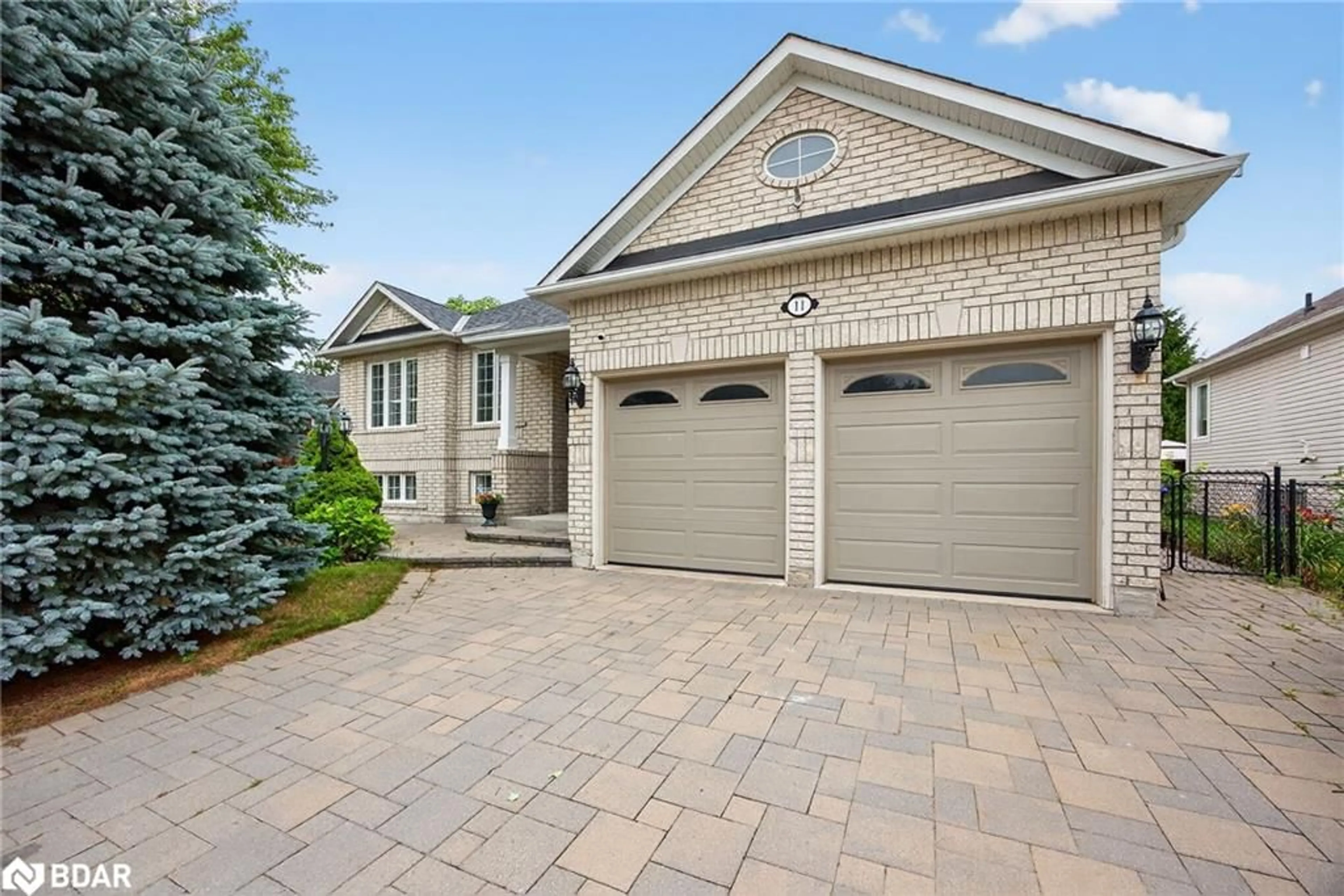 Home with brick exterior material, street for 11 Northwood Dr, Wasaga Beach Ontario L9Z 3B5