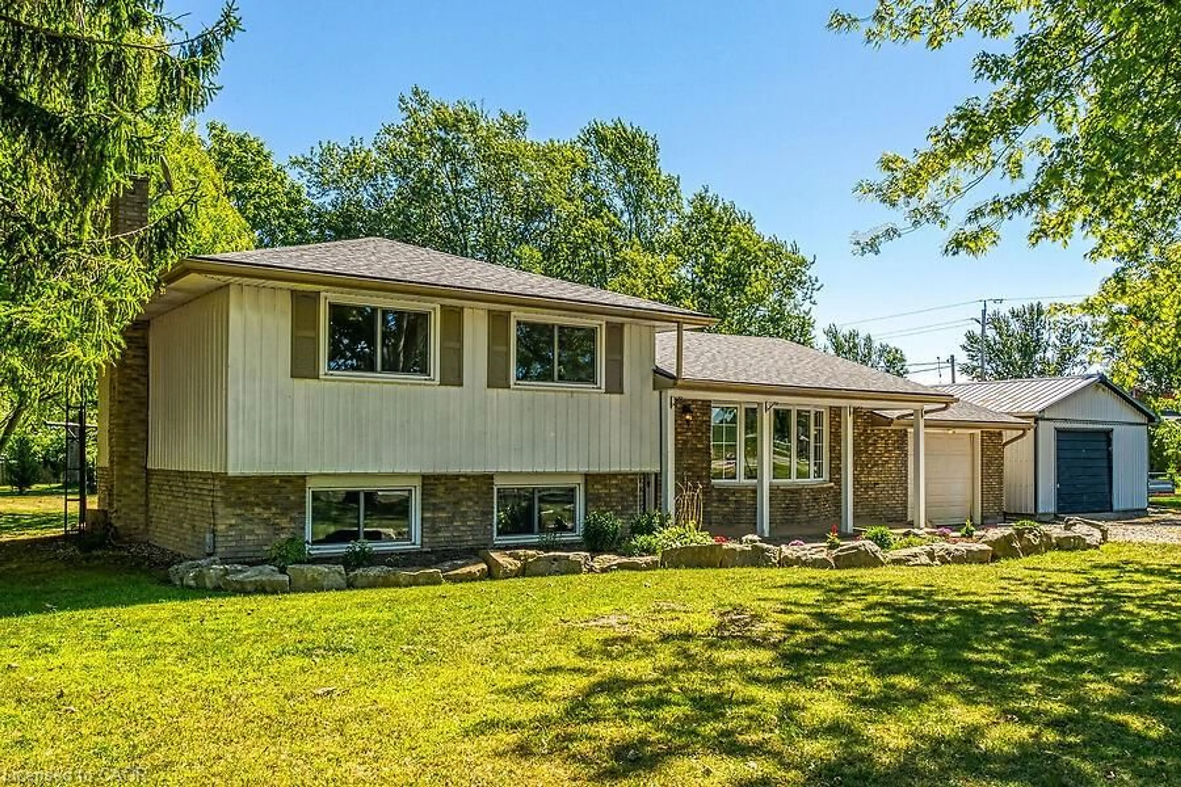 Home with vinyl exterior material, street for 795 Port Maitland Rd, Port Maitland Ontario N1A 2W6