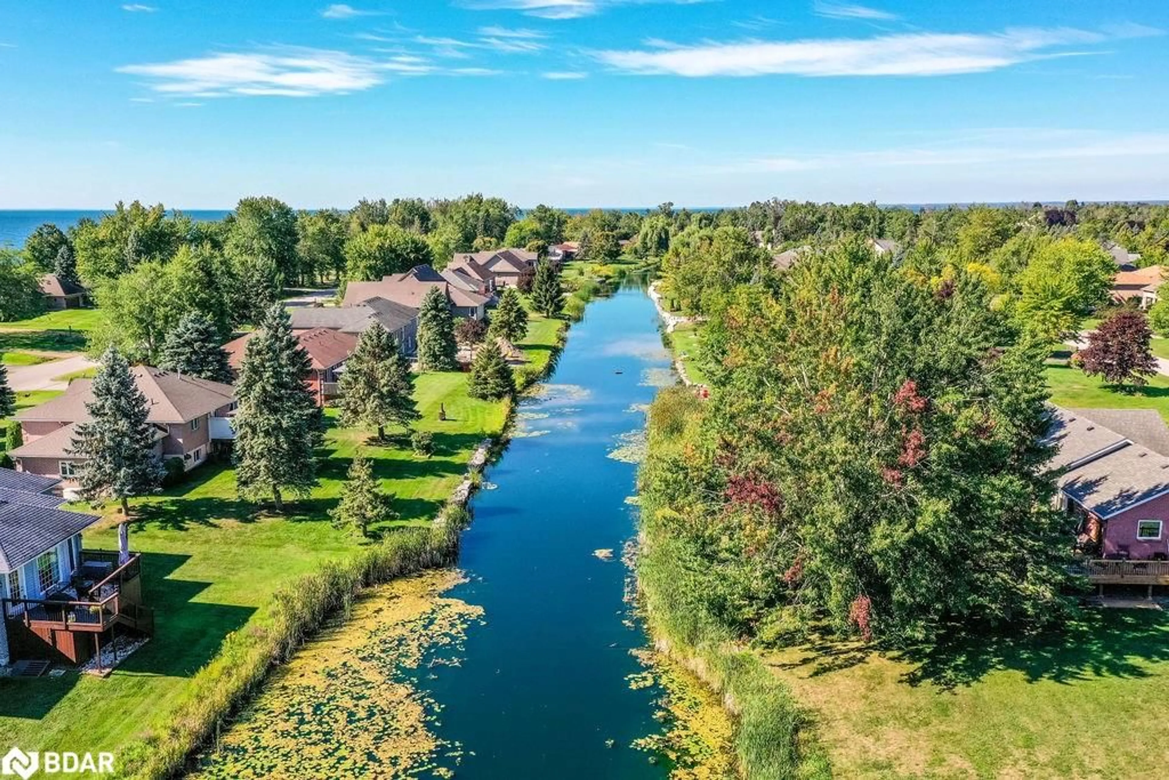 A pic from outside/outdoor area/front of a property/back of a property/a pic from drone, water/lake/river/ocean view for 3 Maple Gate, Brechin Ontario L0K 1B0
