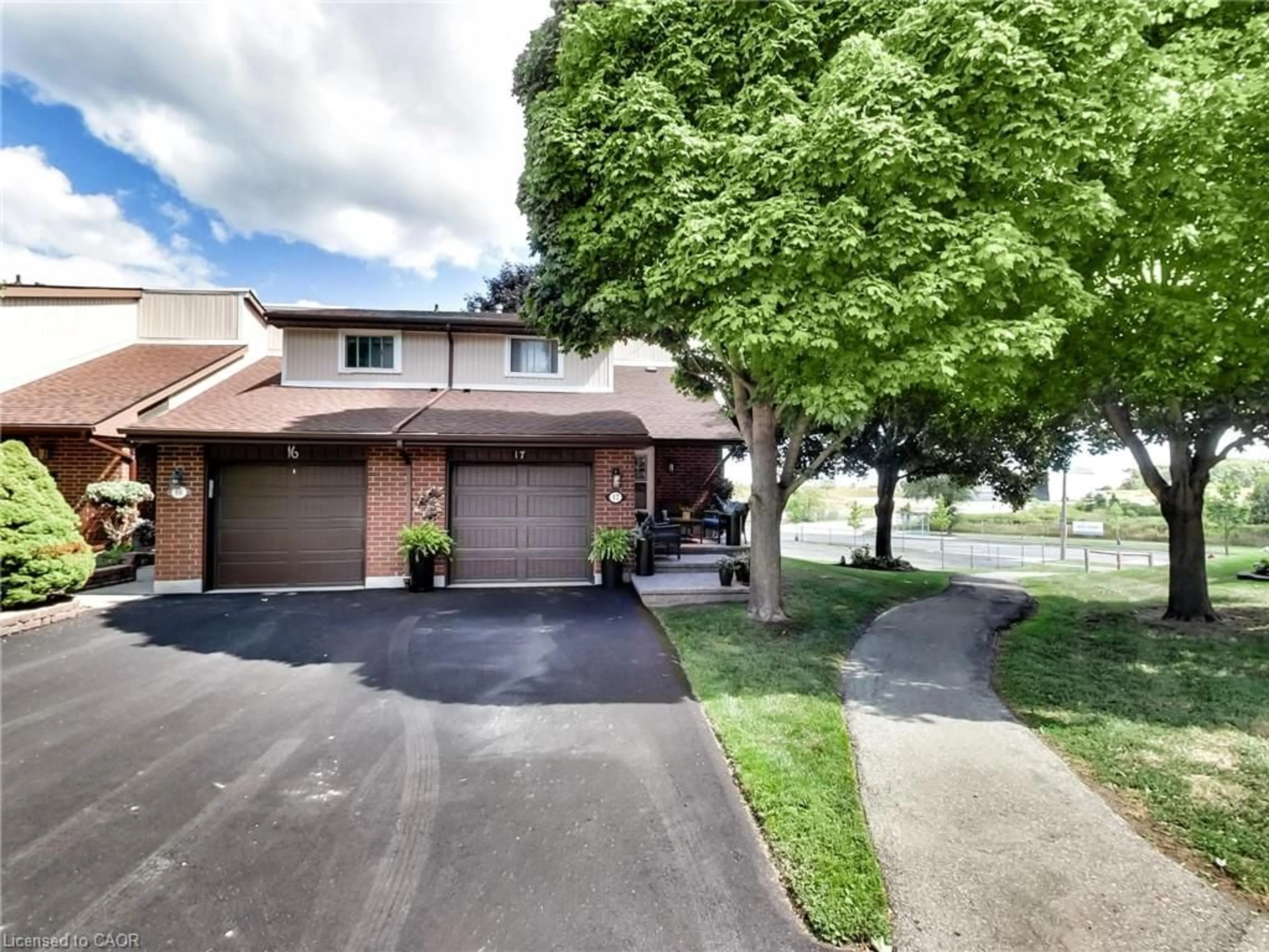 A pic from outside/outdoor area/front of a property/back of a property/a pic from drone, street for 59 Queenslea Dr #17, Hamilton Ontario L8W 1P6