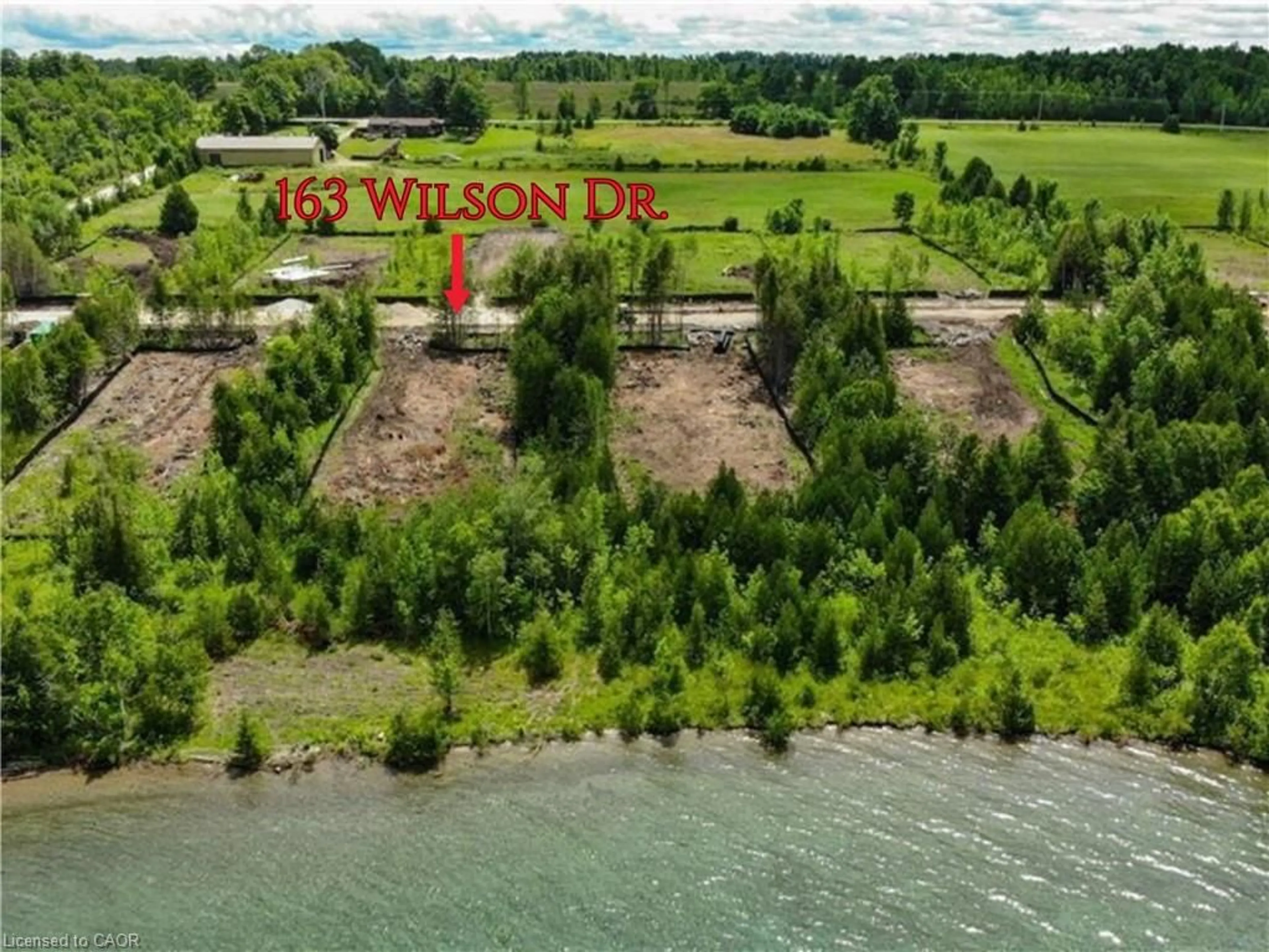 A pic from outside/outdoor area/front of a property/back of a property/a pic from drone, water/lake/river/ocean view for 163 Wilson Dr, Georgian Bluffs Ontario N0H 2T0